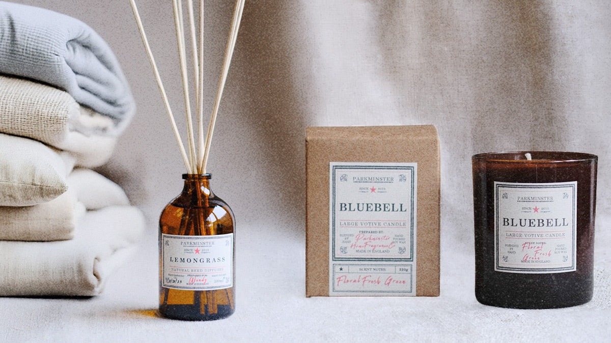 Parkminster Reed Diffuser and a LArge Votive Scented Soy wax candle in a natural product setting