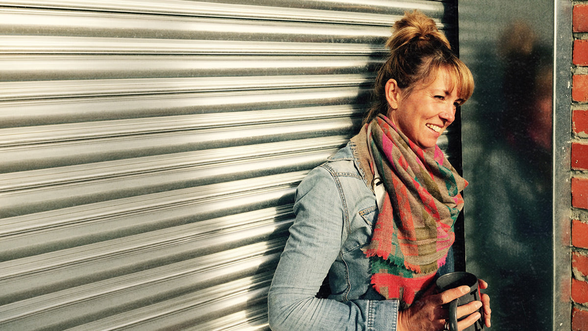 Krystyna Patey, founder of Parkminster, a Cornish candle company, taking a short break outside the Fragrance Workshop where our natural soy wax candles and botanical candle fragrances are hand blended and poured.