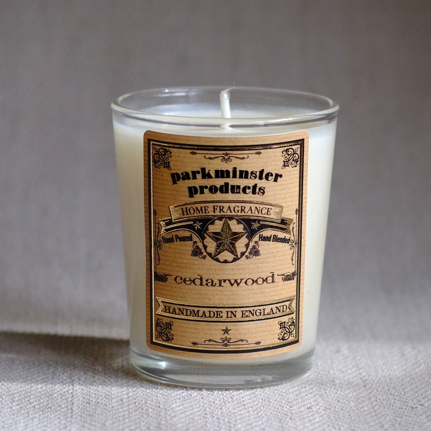 Cedarwood scented soy wax candle with warm, earthy notes. Enjoy a refreshing, natural fragrance blend of 100% essential oils for a welcoming ambiance - Parkminster Natural Candles