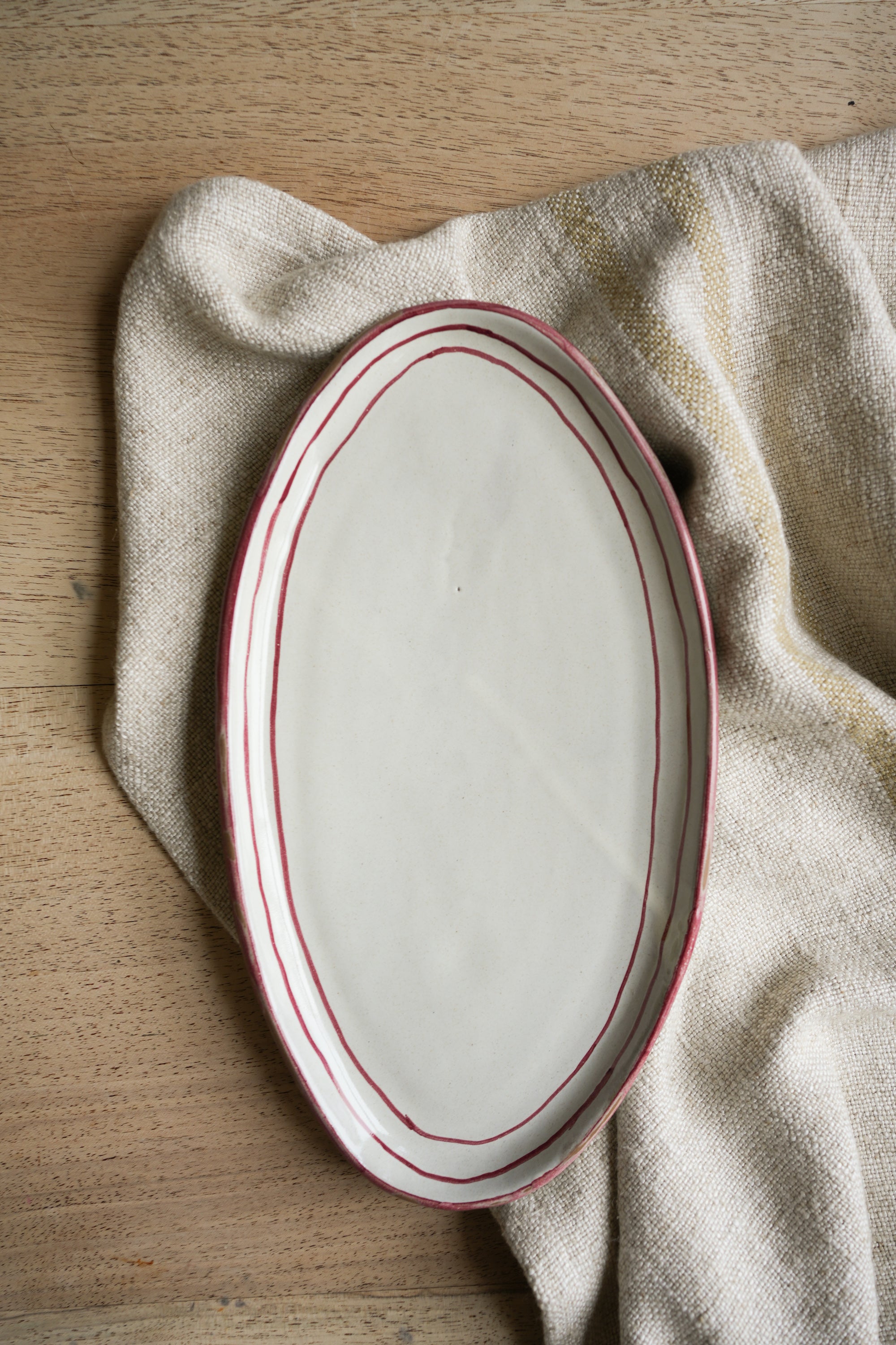 Hand Painted Breton Stripe Oval Plate - Brick curated home decor piece by Parkminster Living