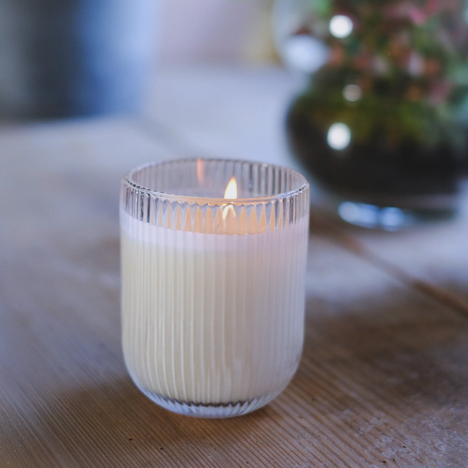 Parkminster Lemongrass HAVEN Candle in ribbed glassware, offering a refreshing citrusy fragrance with energising and rejuvenating properties.