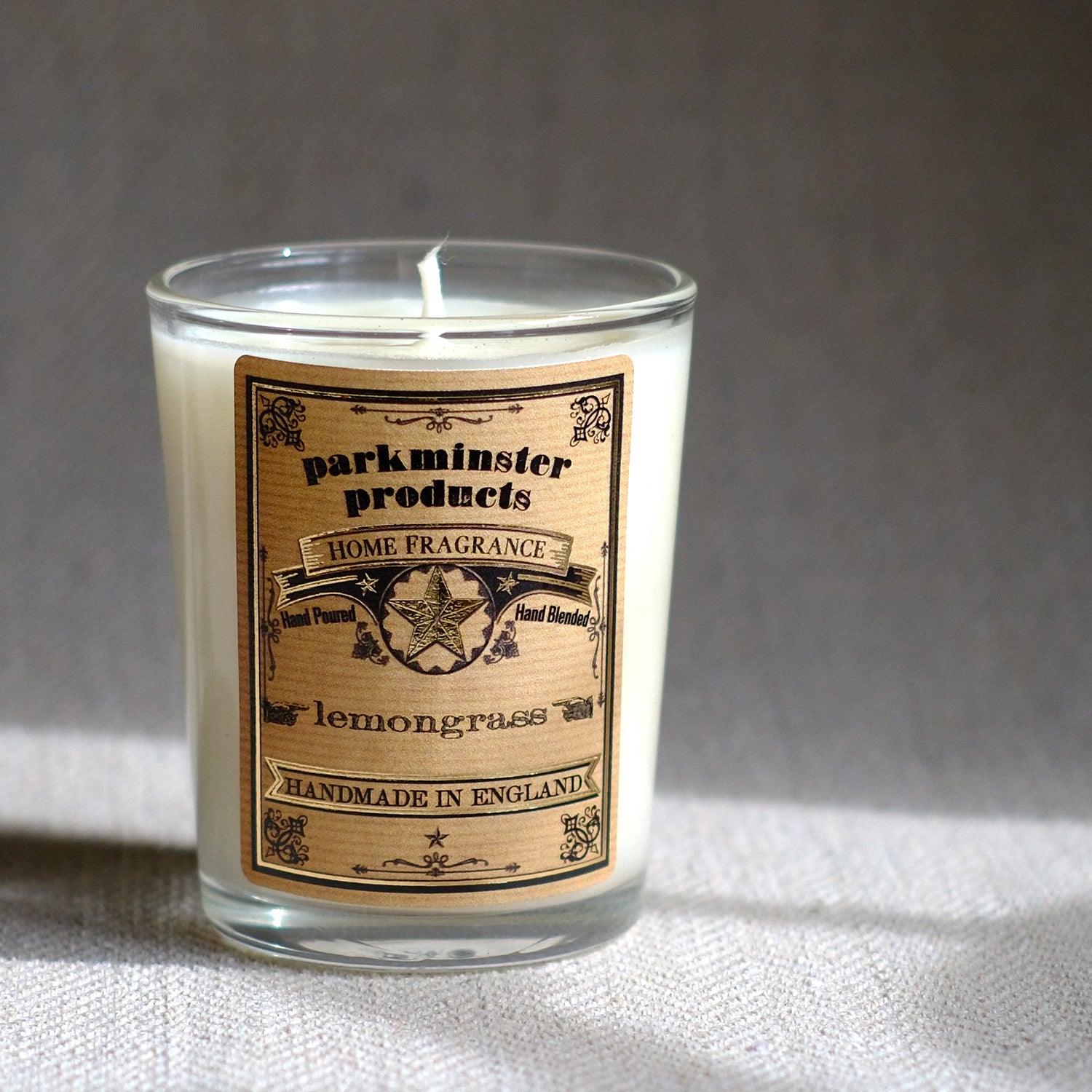 Our Lemongrass scented soy wax candle with sweet, zesty notes and soothing herbal undertones. Elevate your mood and restore energy with this revitalising fragrance - Parkminster Home Fragrances 75g