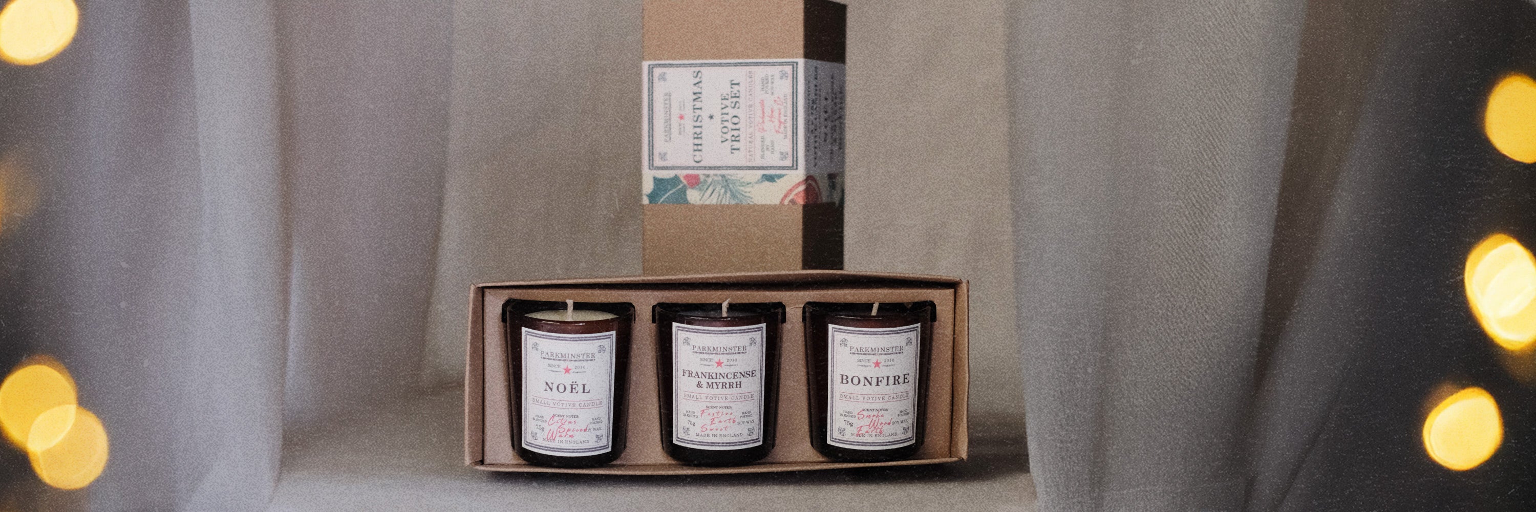 Parkminster Christmas Candle Trio Gift Set – three natural soy wax candles in three festive fragrances, beautifully boxed for a thoughtful Christmas candle gift.