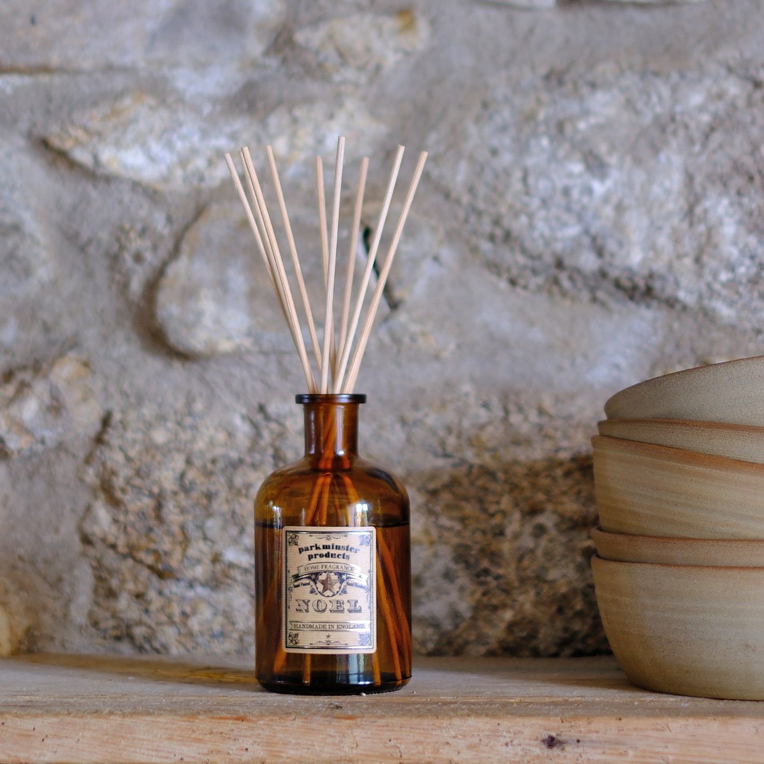 Enhance your holiday atmosphere with our Noel Scented Amber Glass Apothecary Collection 200ml Reed Diffusers by Parkminster Home Fragrance Co (Cornwall). Perfect for Christmas, these diffusers emit a festive blend of seasonal fragrances, making them an ideal addition to your holiday decor.