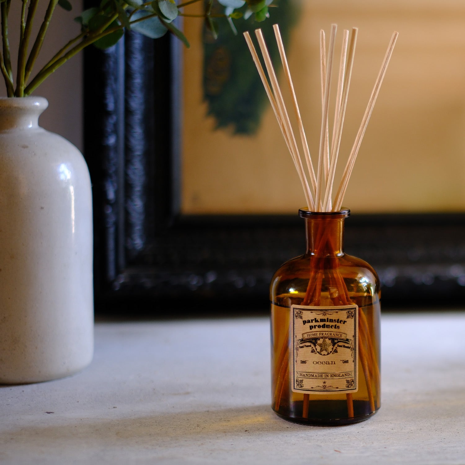 Experience the refreshing Ocean Scented Amber Glass Apothecary Collection 200ml Reed Diffusers by Parkminster Home Fragrance Co (Cornwall). Like a walk across a windy salty beach, these diffusers fill your home with the invigorating essence of the sea.