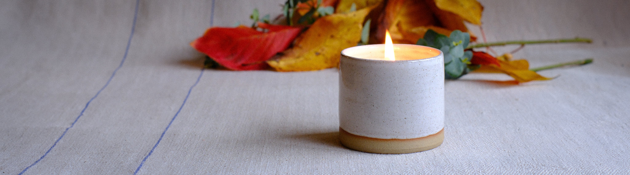 Handmade ceramic pot filled with plant-based waxes and natural fragrances by Parkminster Home Fragrance Company, England. Perfectly sized for any space.