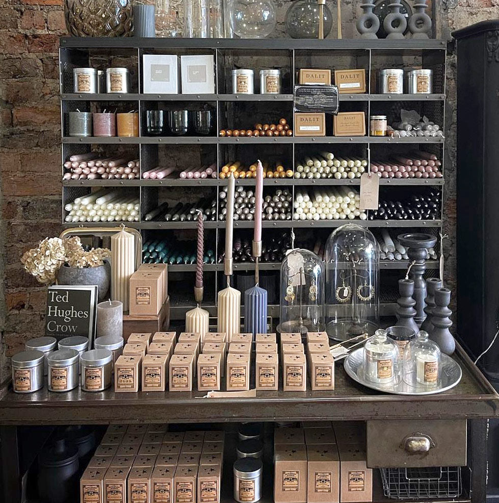 A stylish stockist window display featuring Parkminster’s best-selling scented candles, showcasing their contemporary appeal and popularity with customers seeking natural home fragrance.