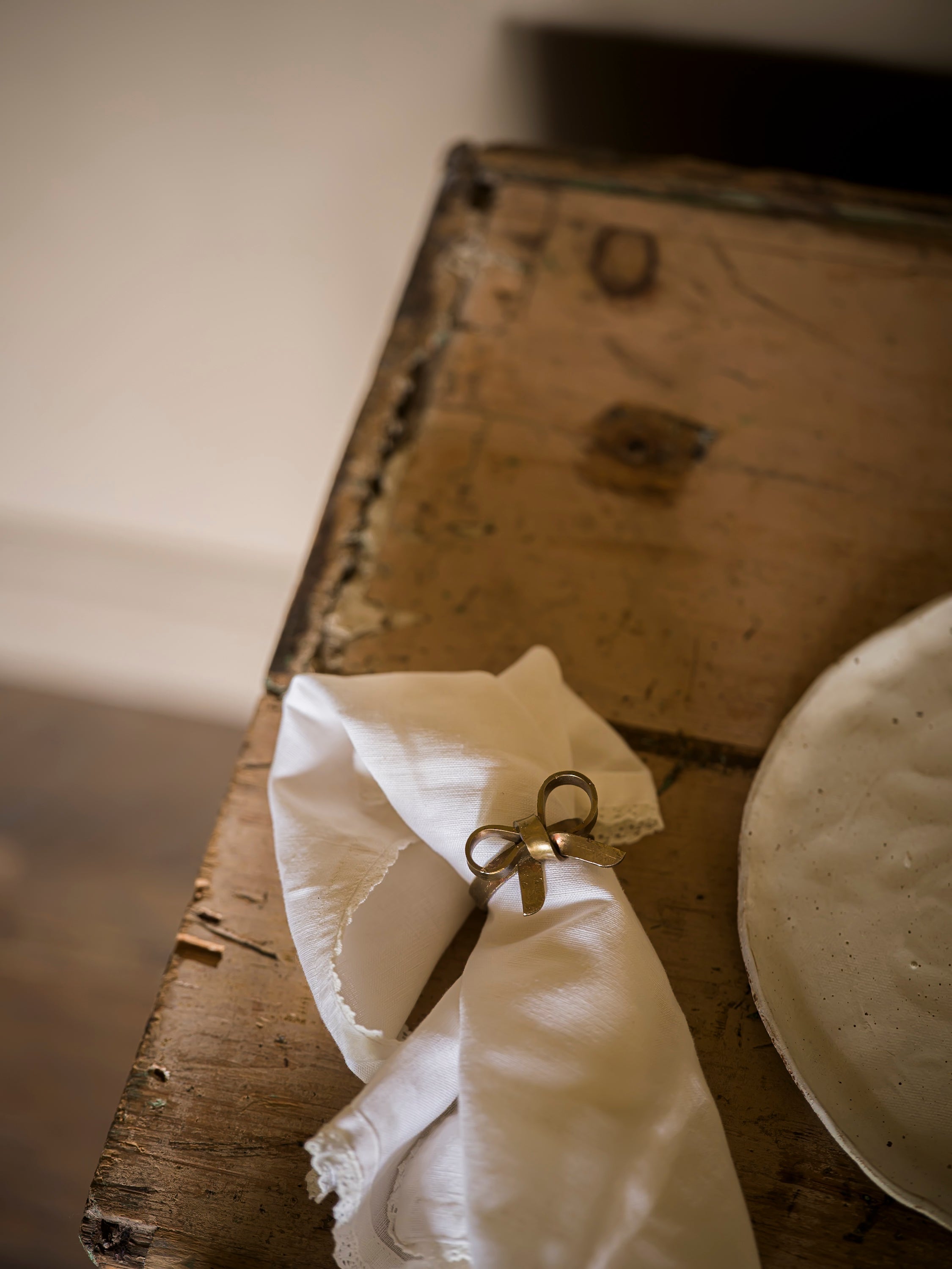 Antique Brass Bow Napkin Ring -Single curated home decor piece by Parkminster Living