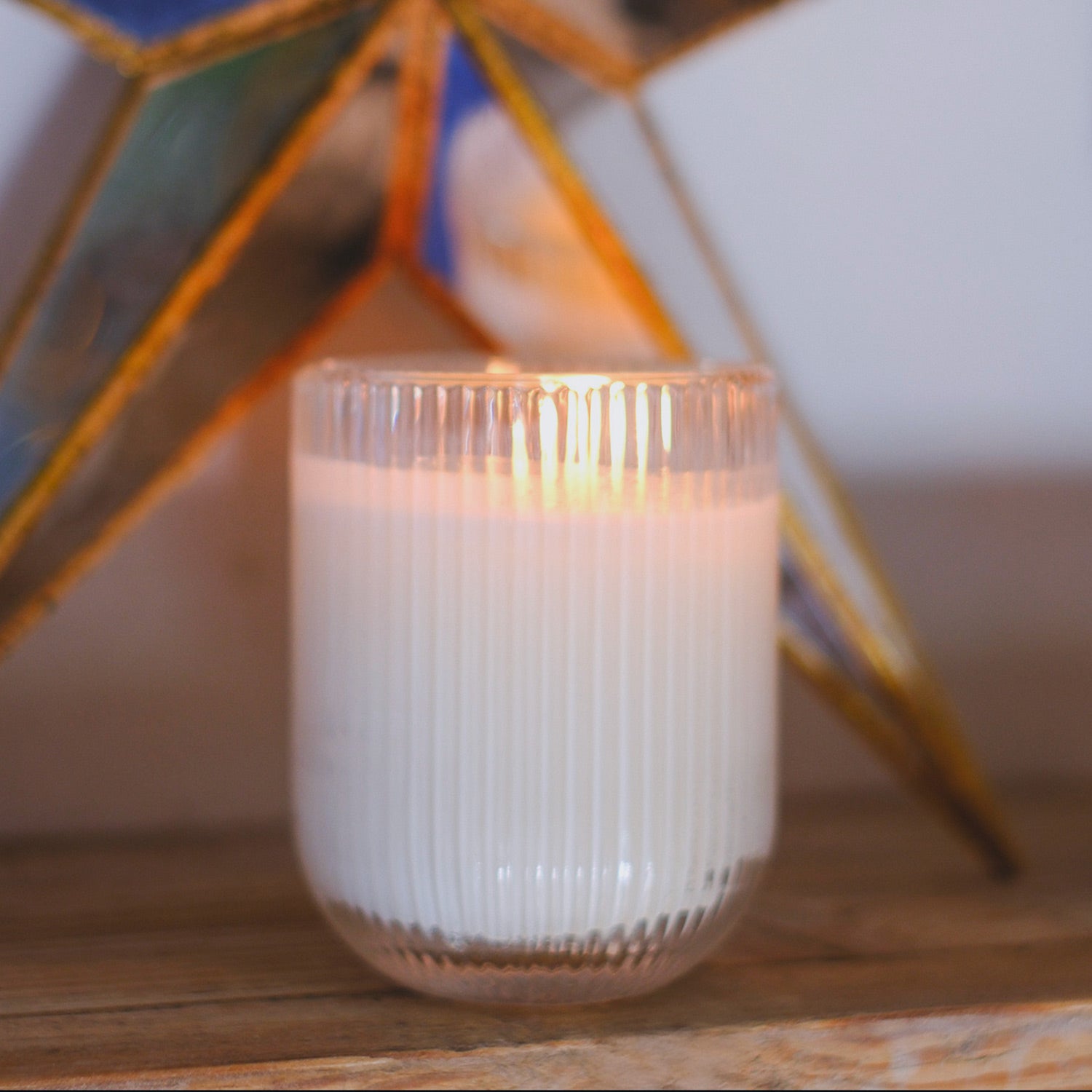 Parkminster Woodland HÆFEN Candle in ribbed glassware, featuring earthy oak, smoky hickory, and wet leaves for a calming, autumn woodland escape.