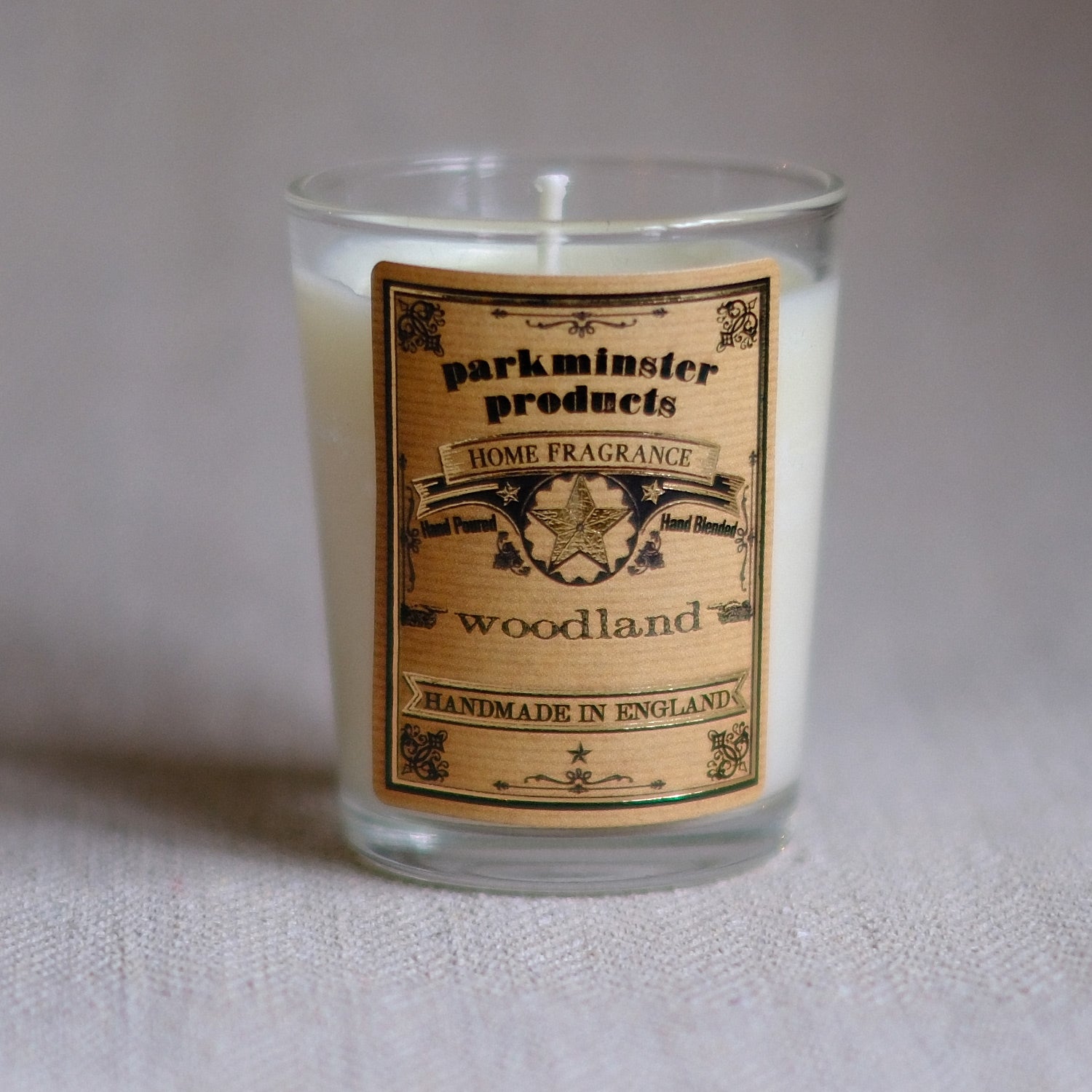 Our Woodland Votive Candle has an earthy, smokey scent with notes of oak, hickory and wet leaves. Perfect for transporting you to autumnal memories of your childhood.