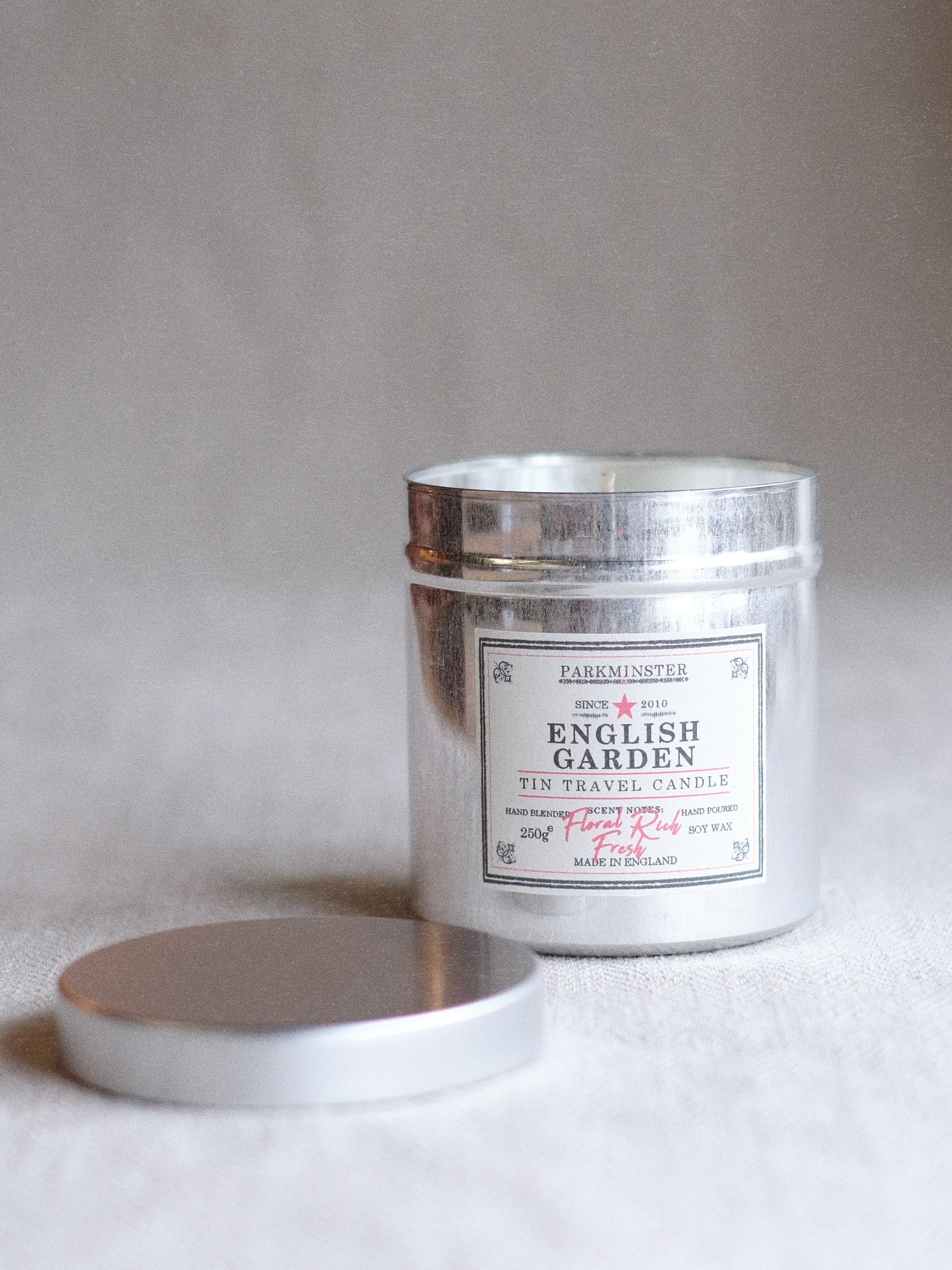 Parkminster English Garden scented tin candle with soft floral fragrance in a reusable metal tin