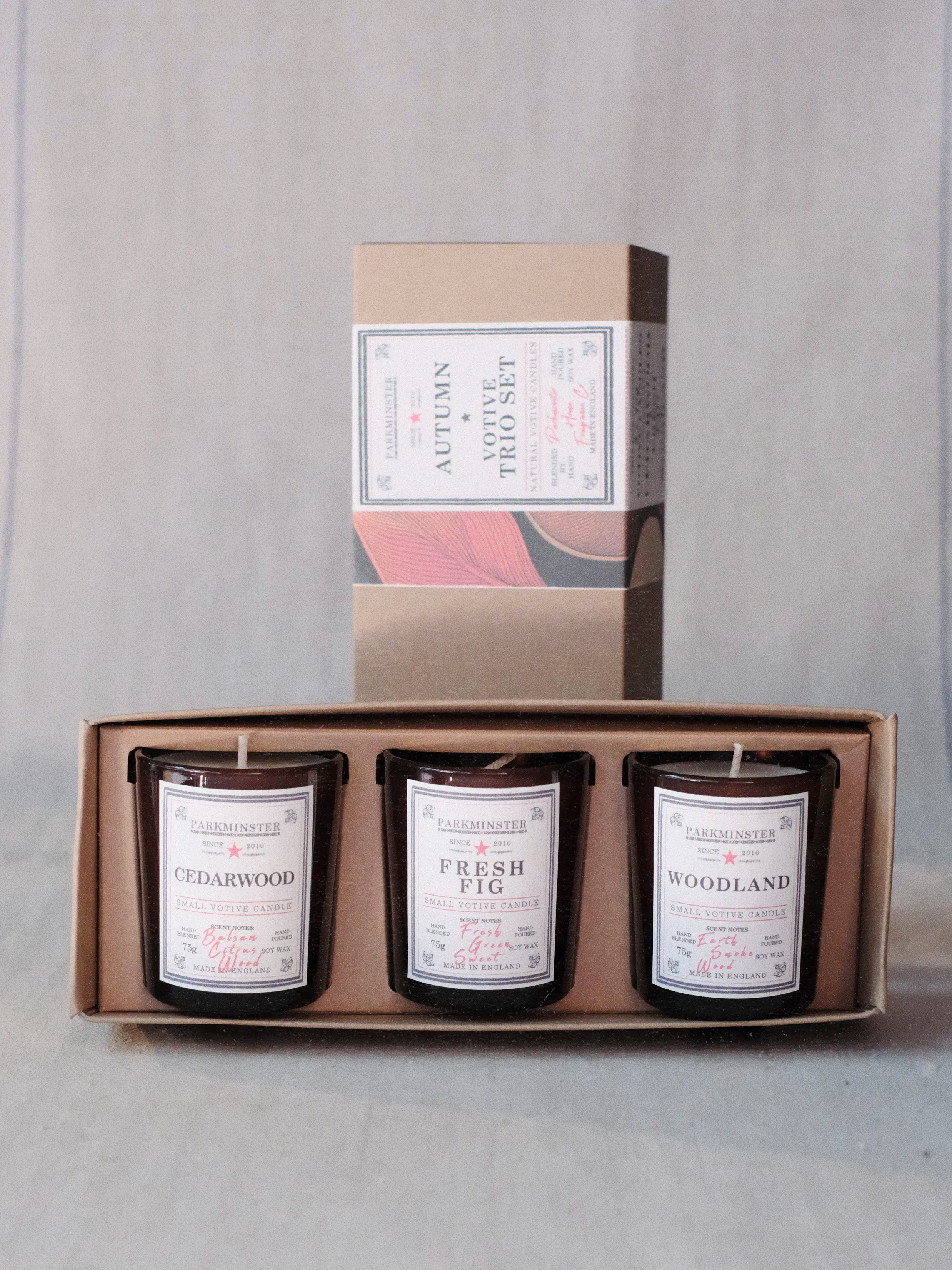 Parkminster Autumn candle gift set – three natural soy wax votive candles with cedar, fresh fig and woodland fragrances, perfect for cosy evenings.