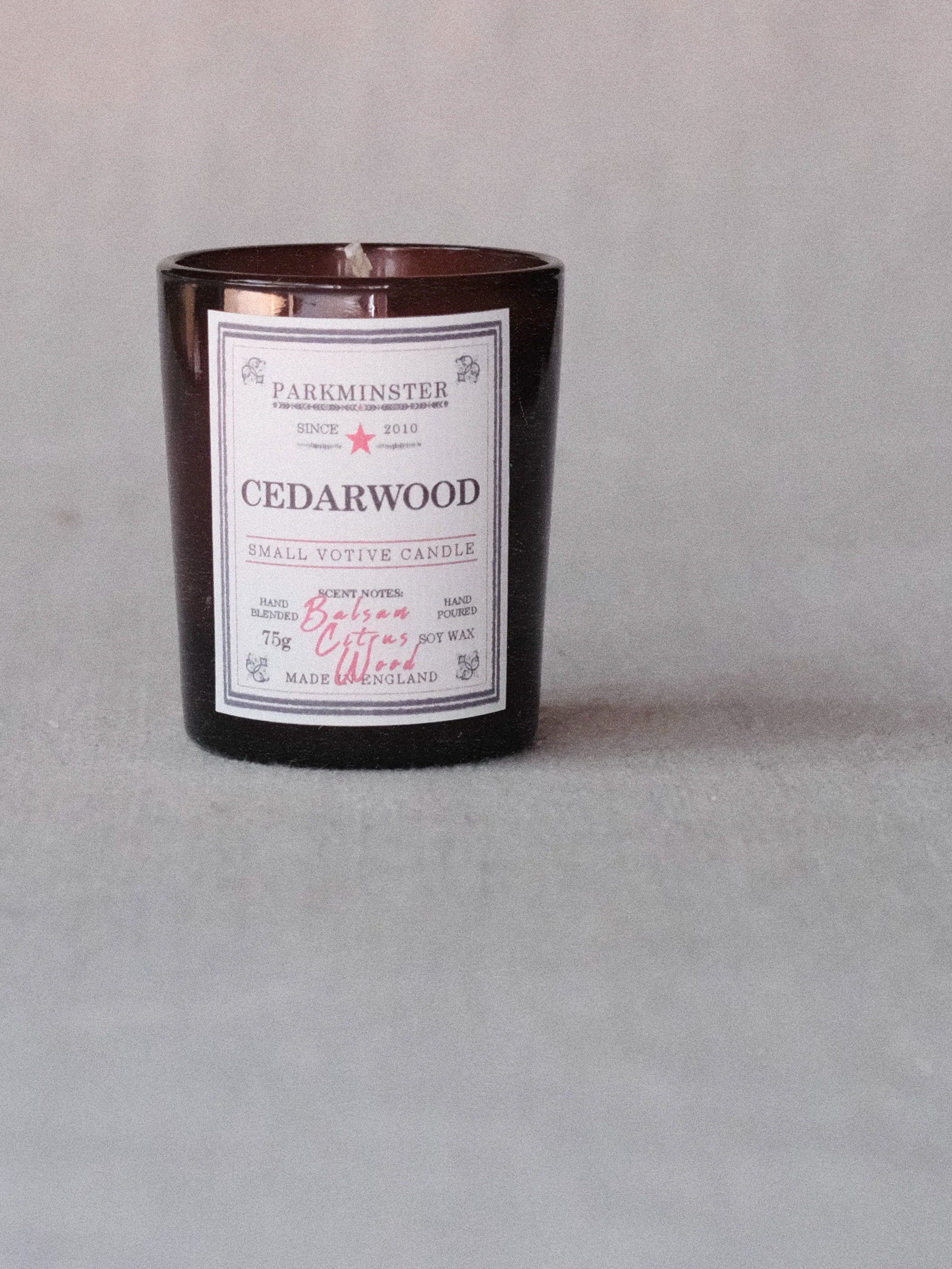 Natural Cedarwood votive candle by Parkminster – hand-poured in Cornwall using plant-based wax and deep woody scent for a cosy home.