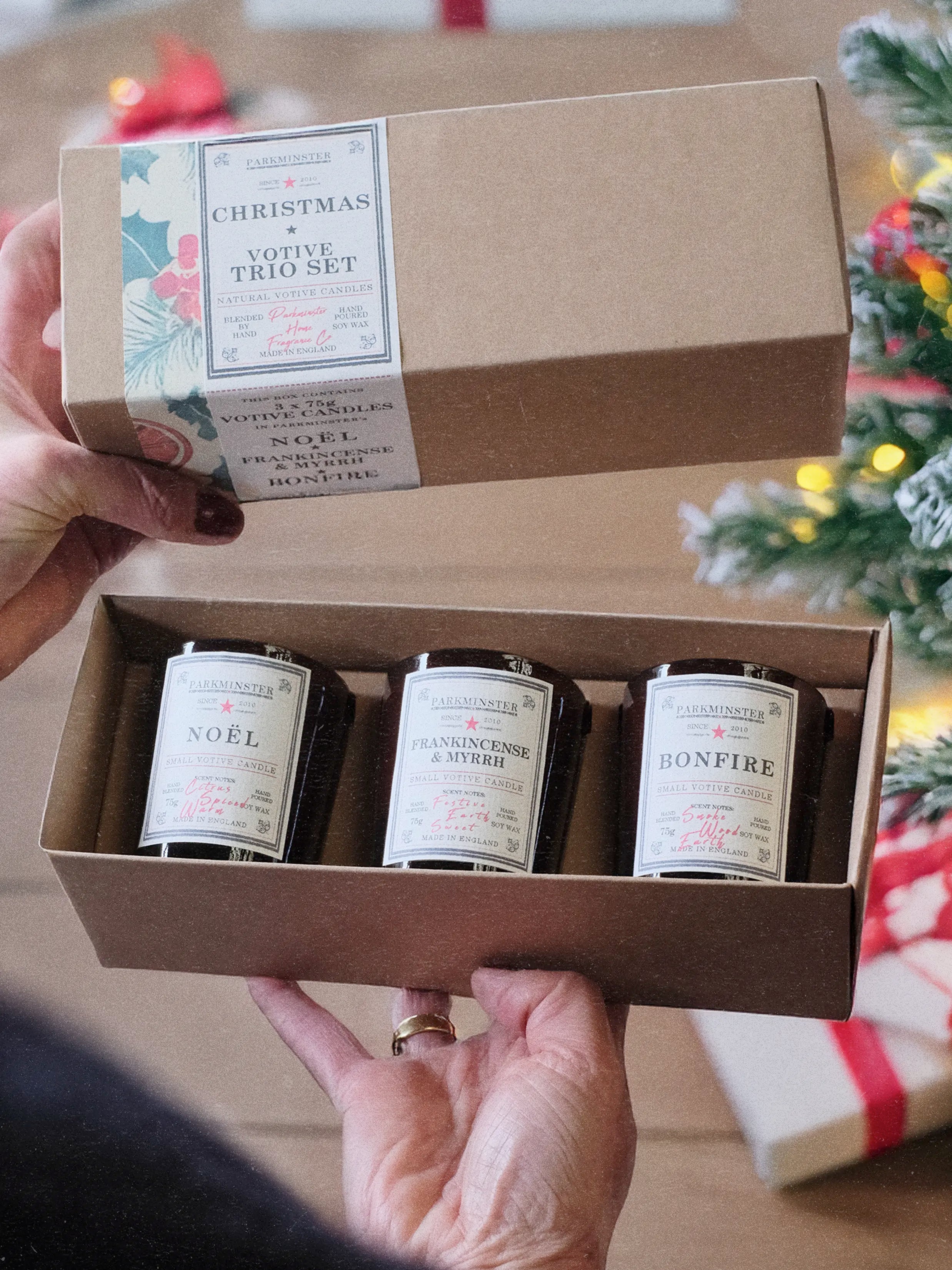 a Parkminster Christmas Votive Trio Pack being opened by someone on Christmas Day - the perfect gift for Christmas