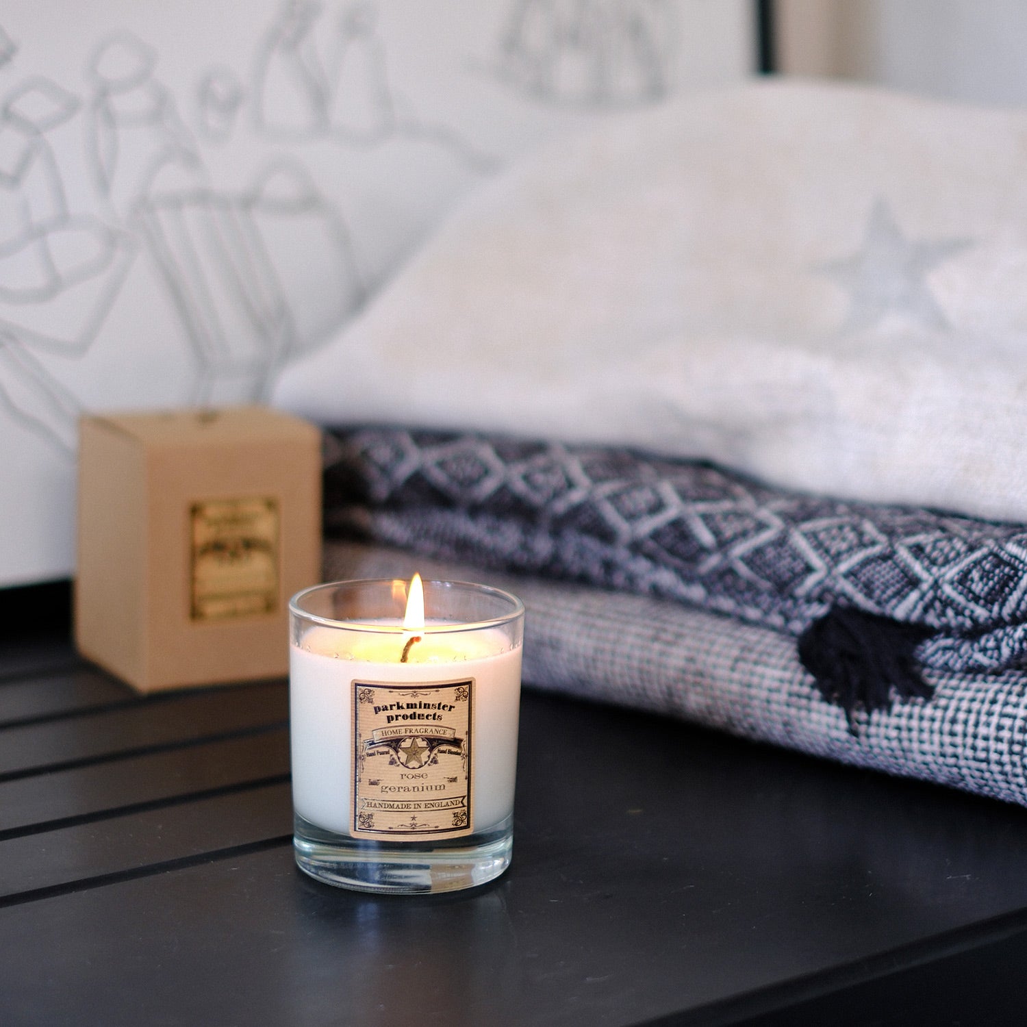 Rose Geranium Scented Soy Candle: Handcrafted in Cornwall by Parkminster, this 220g candle features a floral, fresh, and sweet aroma. Made from sustainable soy wax, plastic-free, with an option for packaging-free.