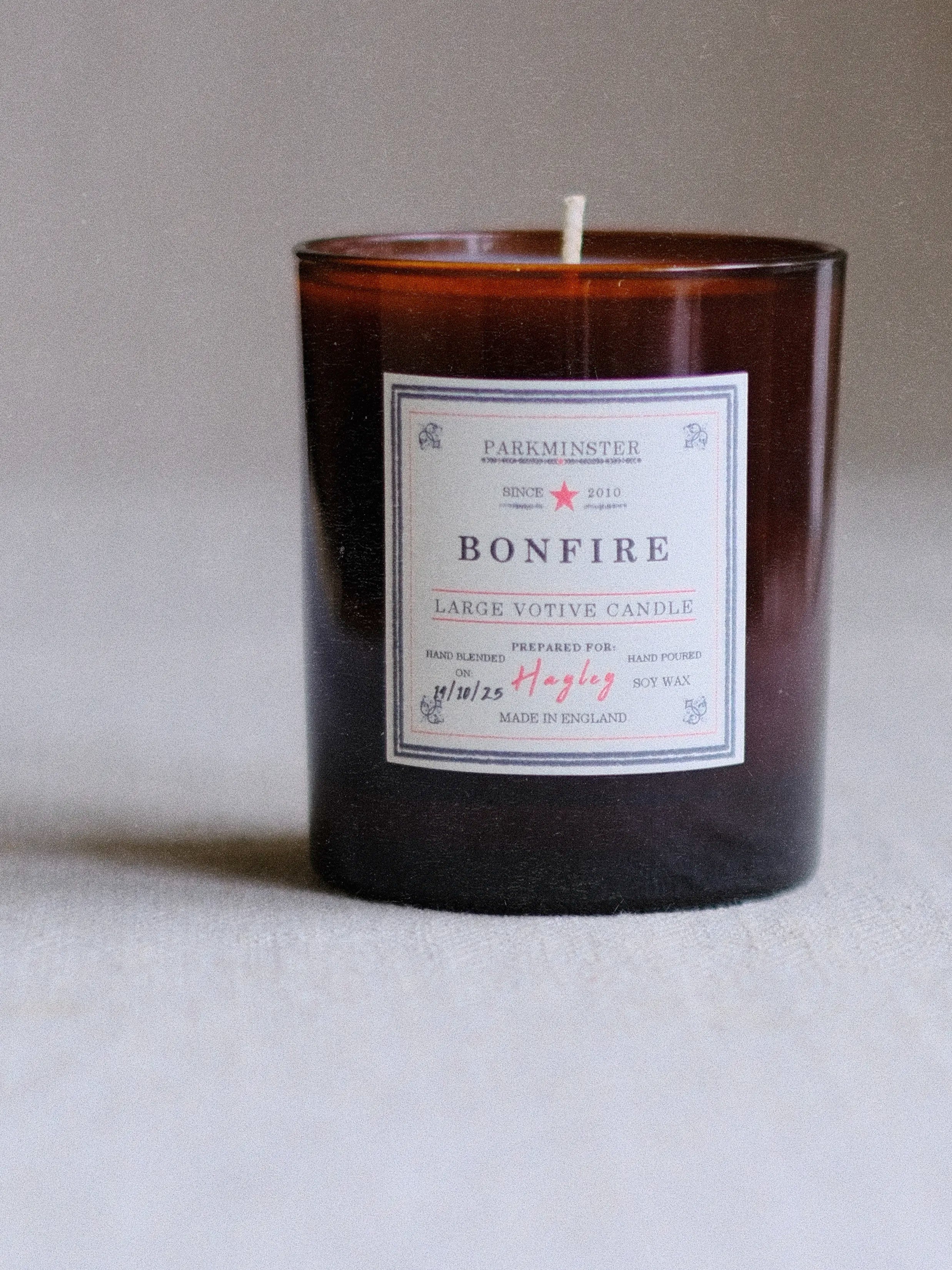 Amber jar Bonfire candle by Parkminster – rich smoky-woody scent evoking crackling fires and wet leaves burning in Autumn
