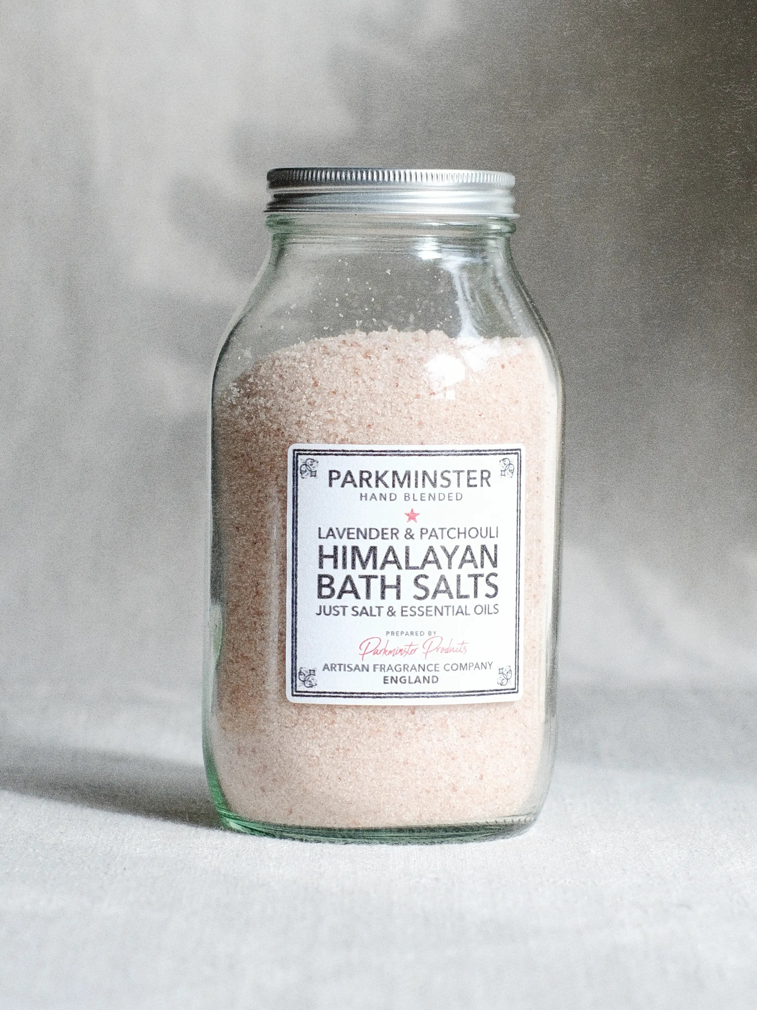 Lavender and rosemary Himalayan bath salts with essential oils to relax, de-stress and soothe the mind while cleansing skin.