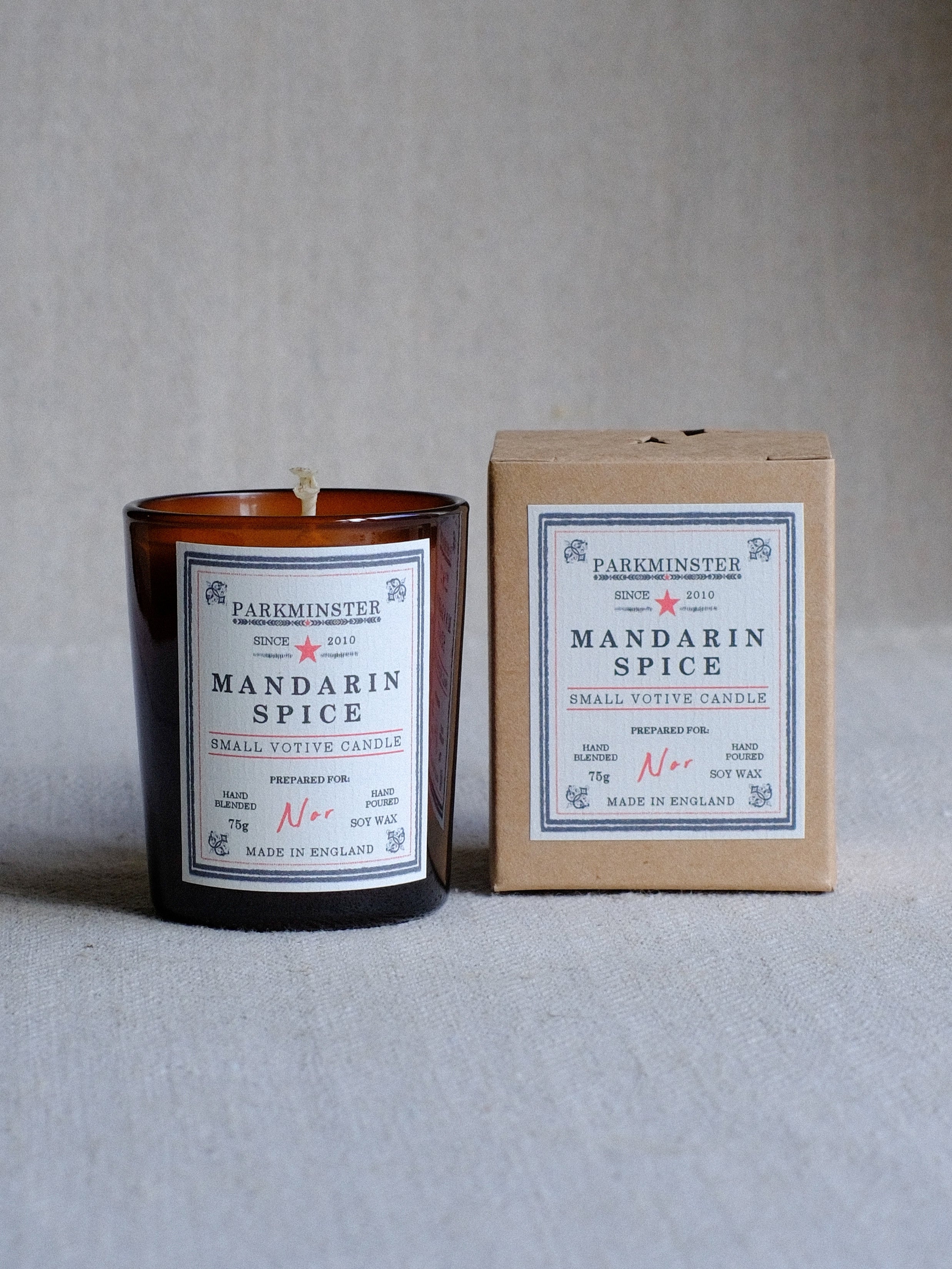 Parkminster’s Mandarin Spice Small Votive Candle is hand-poured in natural soy wax and captures the essence of Christmas candle gifts. With a festive blend of warm spices and bright mandarin, this cosy fragrance is perfect for gifting in its elegant boxed option or enjoying unboxed at home throughout the holiday season.