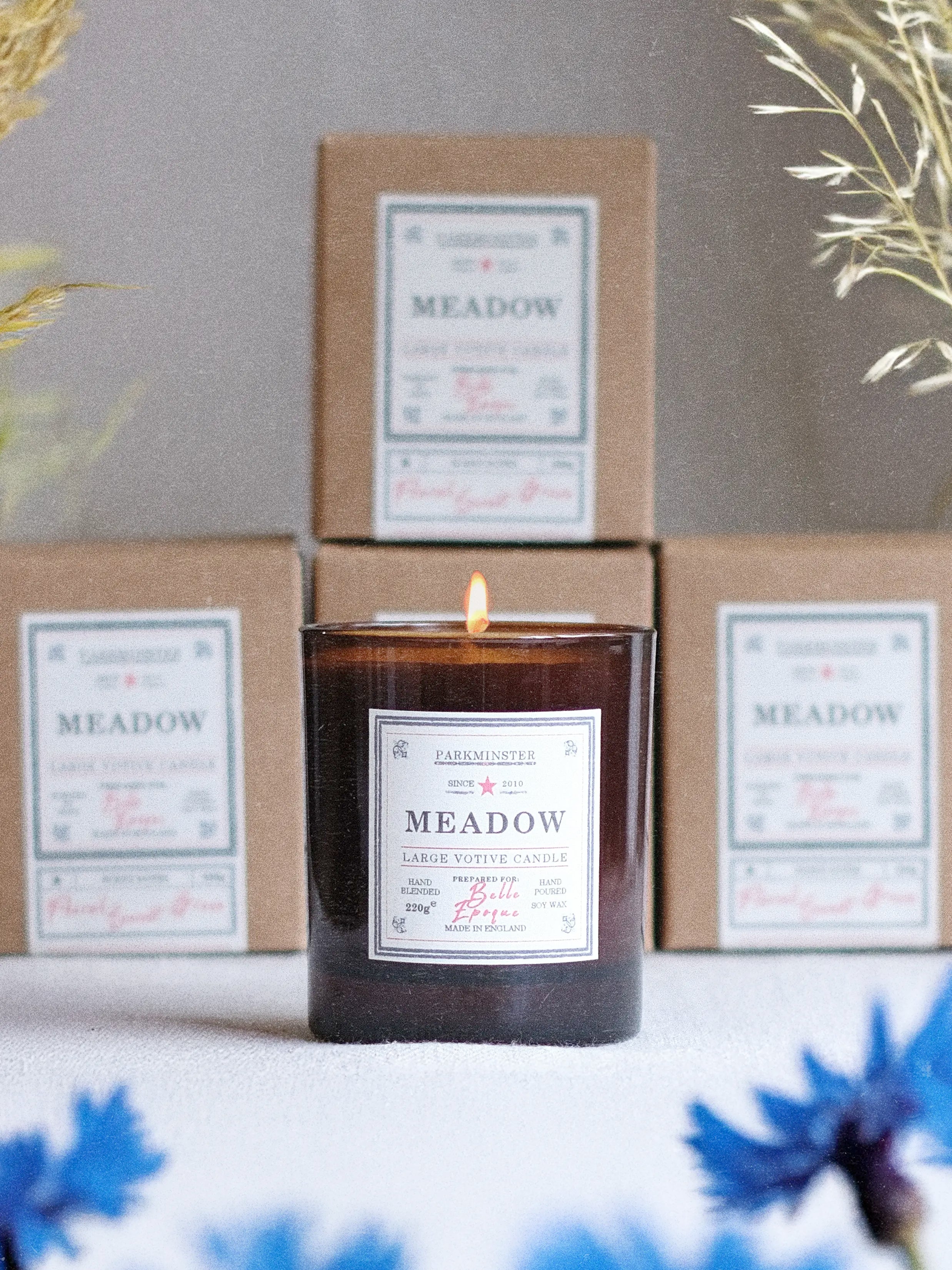 Parkminster Meadow large votive soy candle in amber glass jar with recycled kraft box, floral, citrus, amber, and rose fragrance, personalised label option