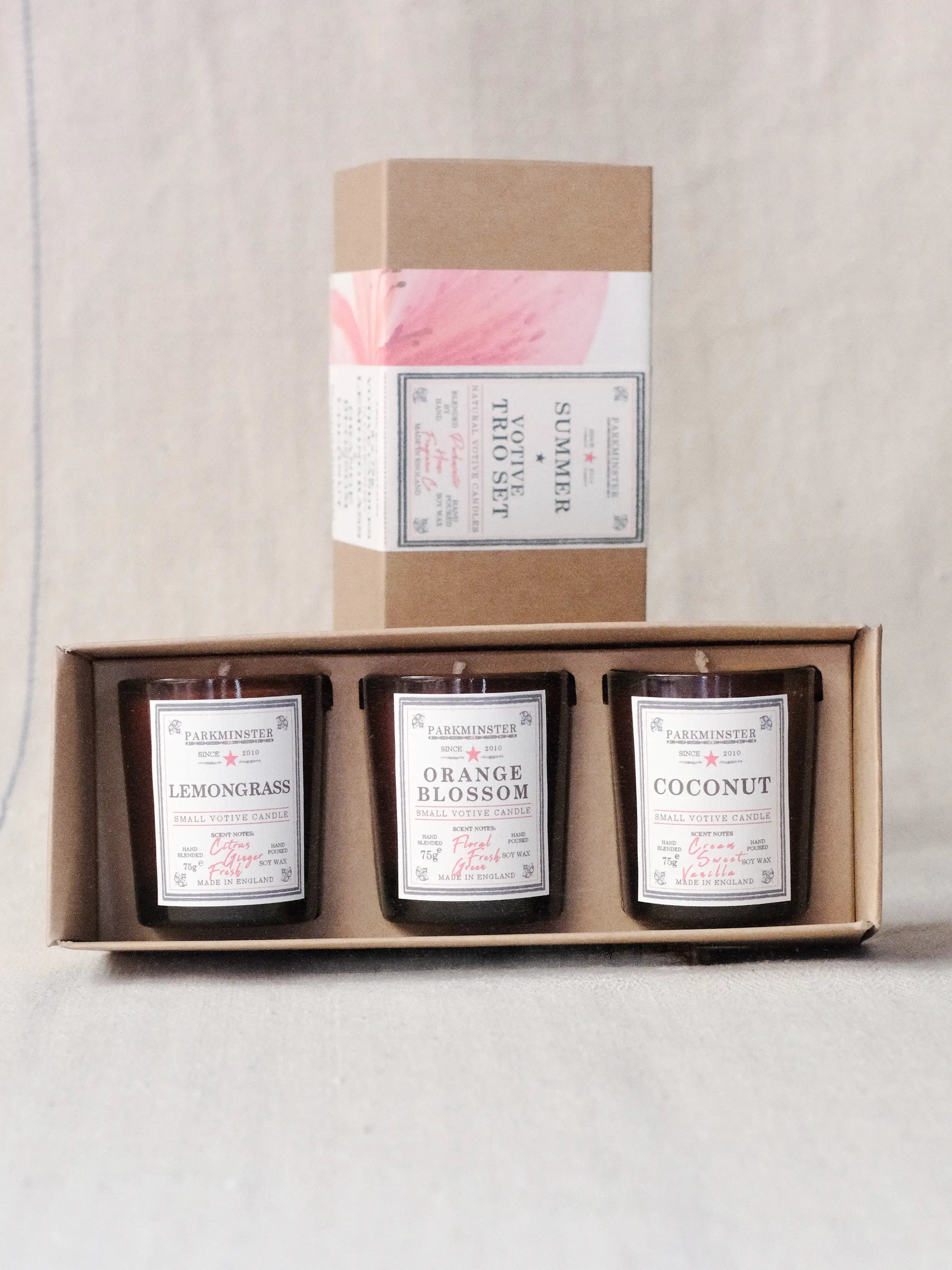 a Summer Triple Votive Candle Gift Set with lemongrass, coconut and orange blossom soy candles all packaged in a Kraft Paper Gift Box