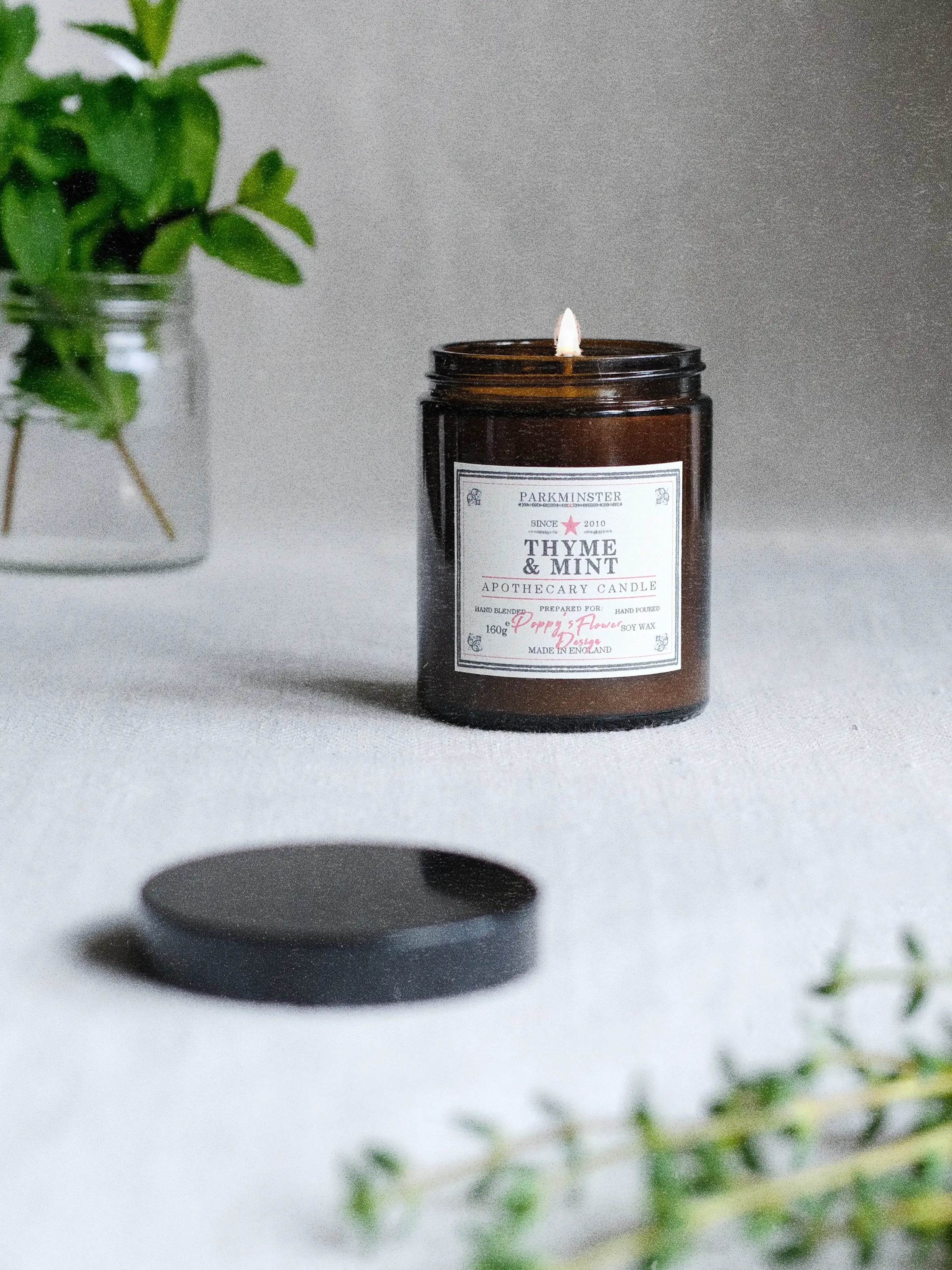 Parkminster Thyme and Mint Apothecary Candle in vintage amber glass jar with natural soy wax and fresh herbal fragrance for modern and rustic interiors