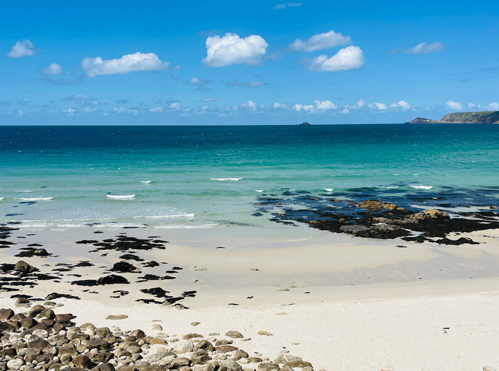 Sunny Cornish beach near Parkminster's workshop, reflecting the natural serenity captured in our Fresh Fig and Ocean scented candles