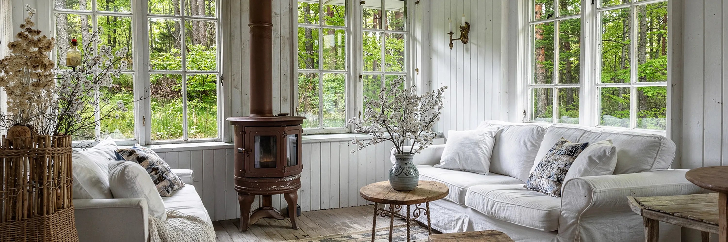 Bright, welcoming Cornish lounge styled by Parkminster founder Krystyna, featuring cosy furniture, rugs, cushions, throws and elegant living room décor from the Lounge & Living collection.