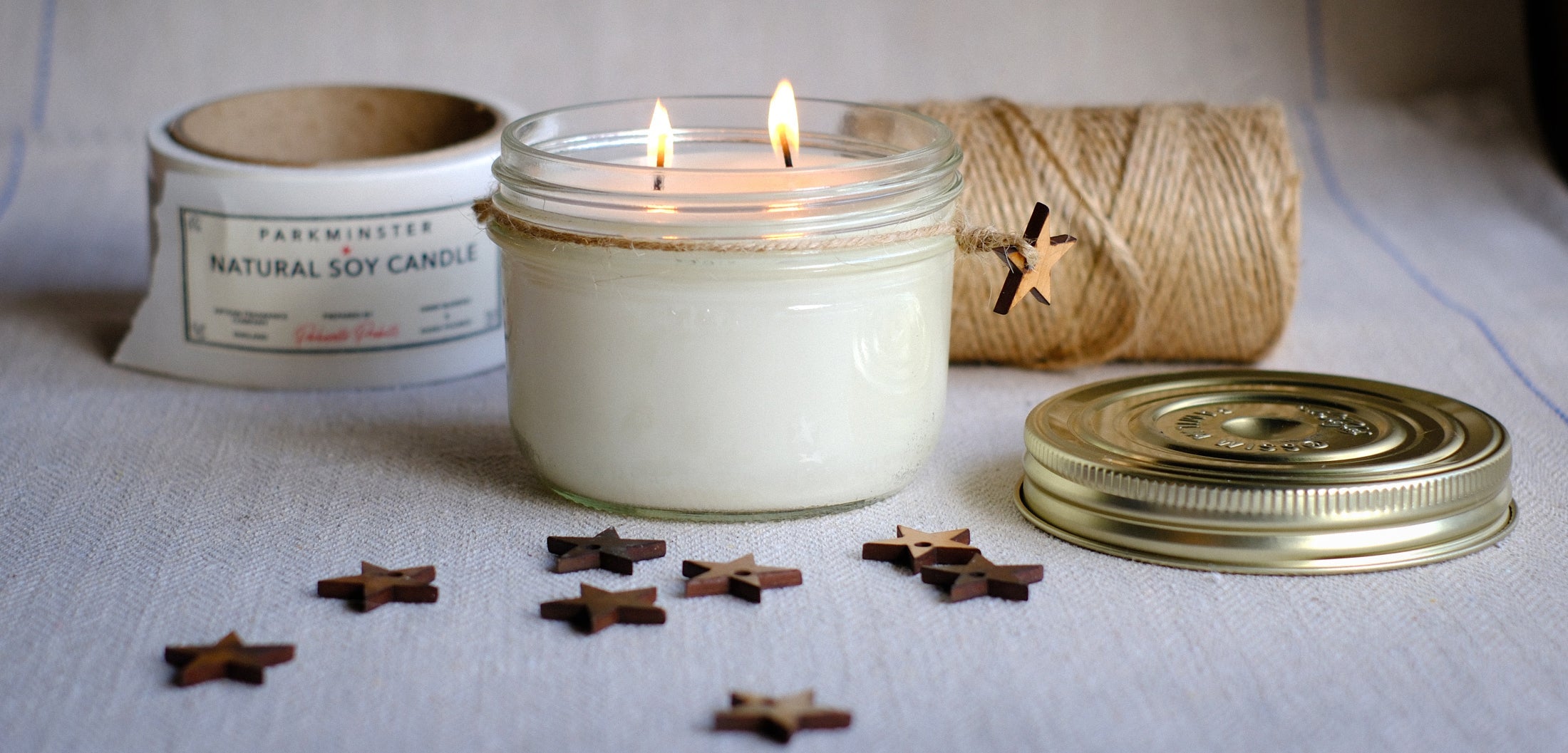 Parkminster's Vintage Star Jar Candles: Discover 27 signature fragrances in our scented soy candles. Each candle is housed in a unique jar adorned with our wooden star. 