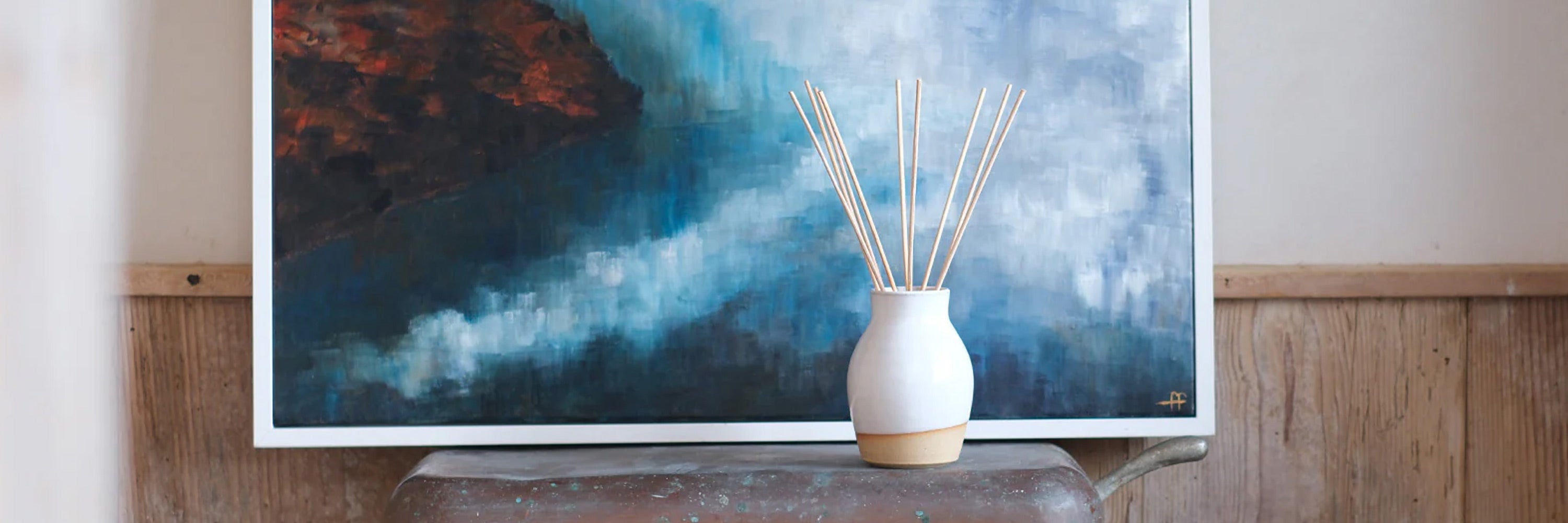 Handcrafted ceramic reed diffusers from the Kiln Collection, featuring unique designs and natural, plant-based fragrances.