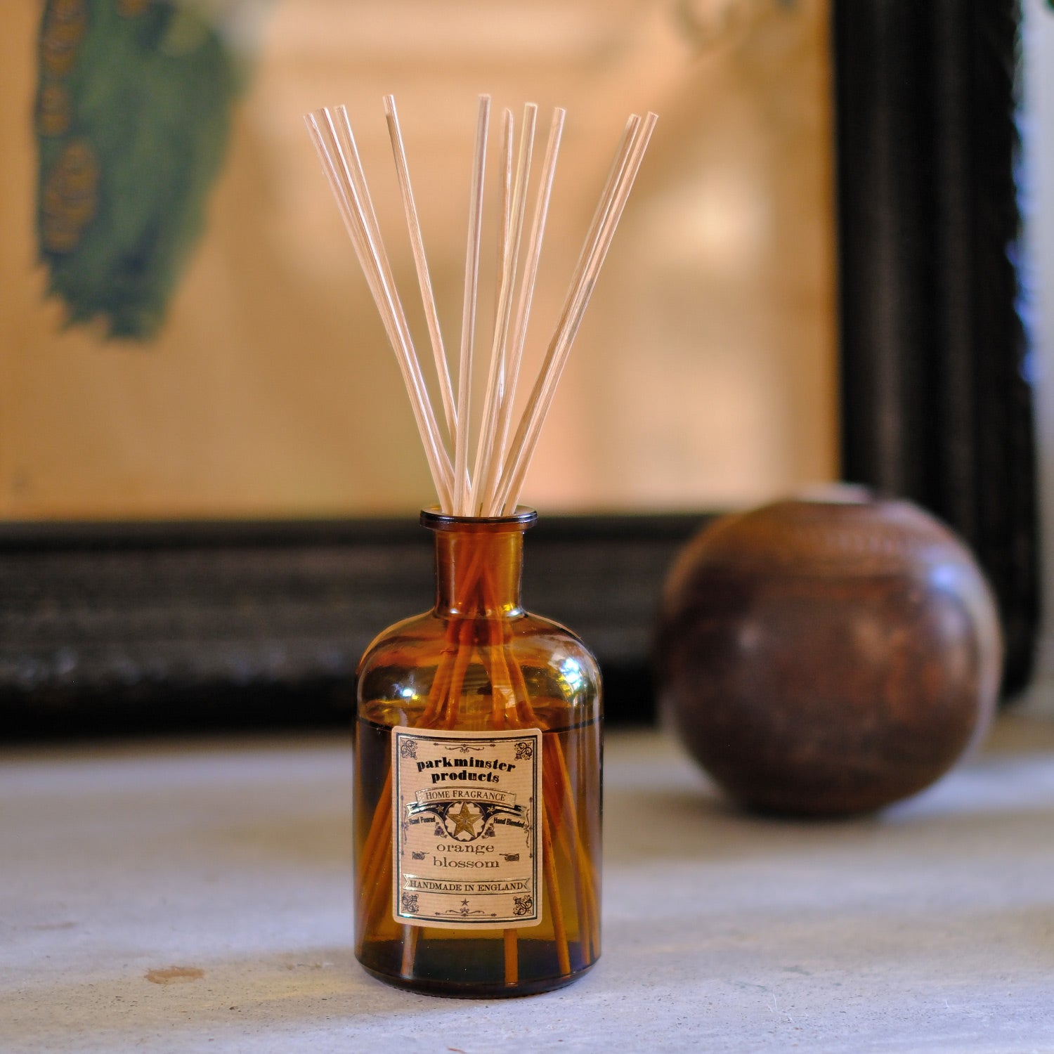 Experience the fresh and invigorating scent of Orange Blossom with our Amber Glass Apothecary Collection 200ml Reed Diffusers by Parkminster Home Fragrance Co (Cornwall). These diffusers combine floral and fruity notes, creating a refreshing and uplifting ambiance.