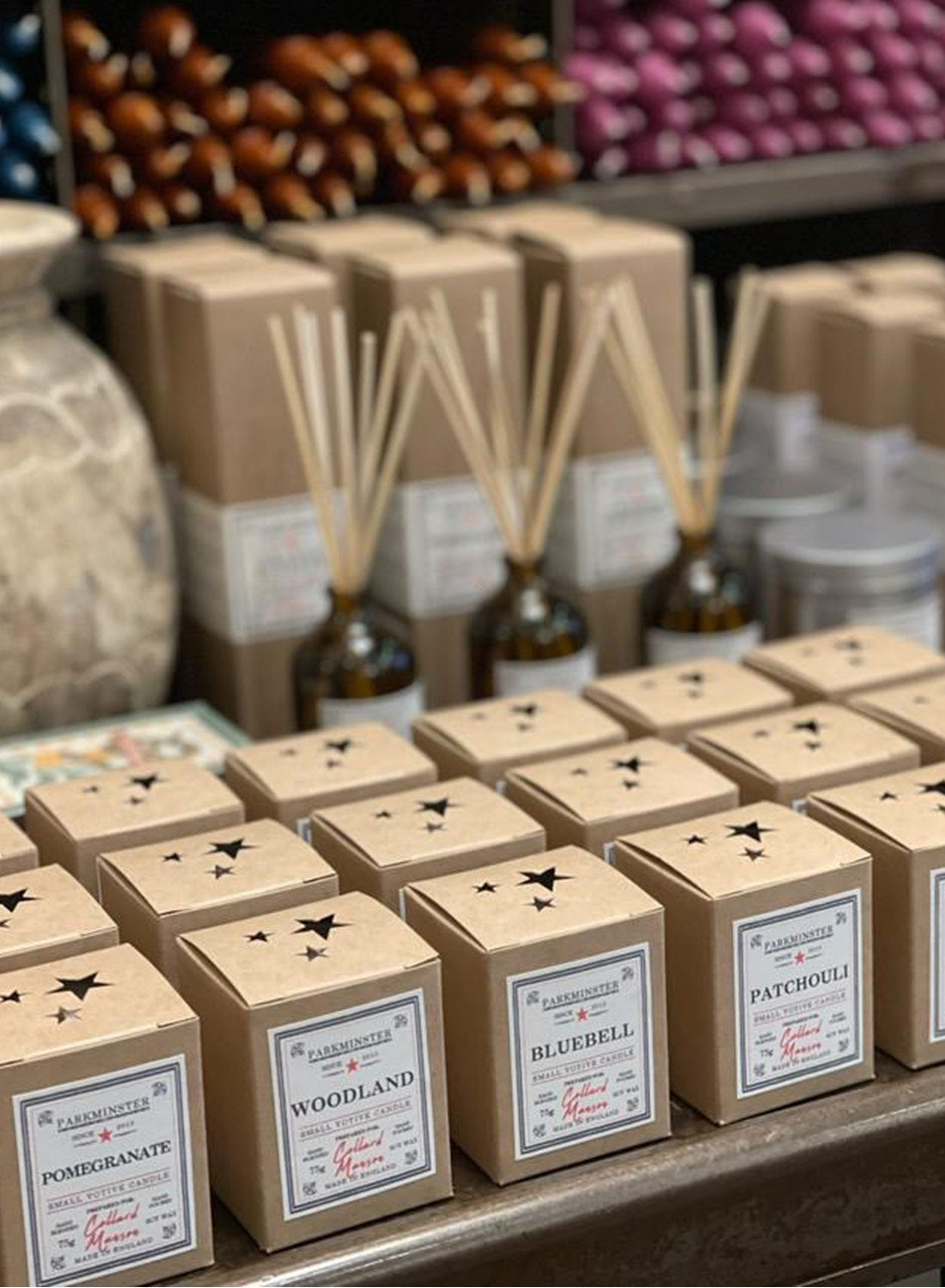 A stylish stockist display featuring Parkminster’s best-selling scented candles and diffusers, showcasing their contemporary appeal and popularity with customers seeking natural home fragrance.