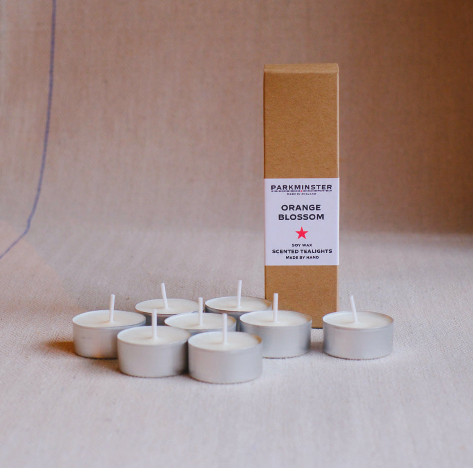 Parkminster Home Fragrance Co's Orange Blossom Tealights – a pack of 8 hand-blended and hand-poured tealights, made to order for guaranteed freshness. Natural and fragrant, perfect for creating a warm and inviting atmosphere.