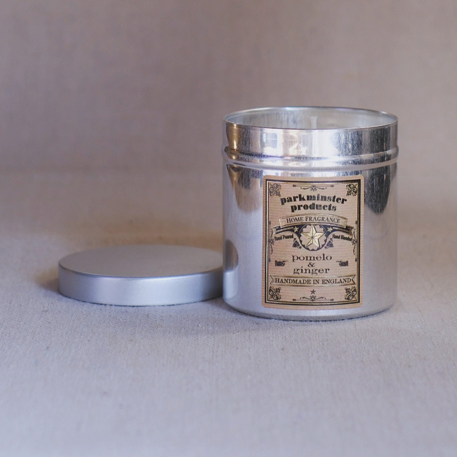 Pomelo & Ginger Scented Tin Candle, made with natural soy wax and essential oils, in a stylish aluminium tin 280g by Parkminster