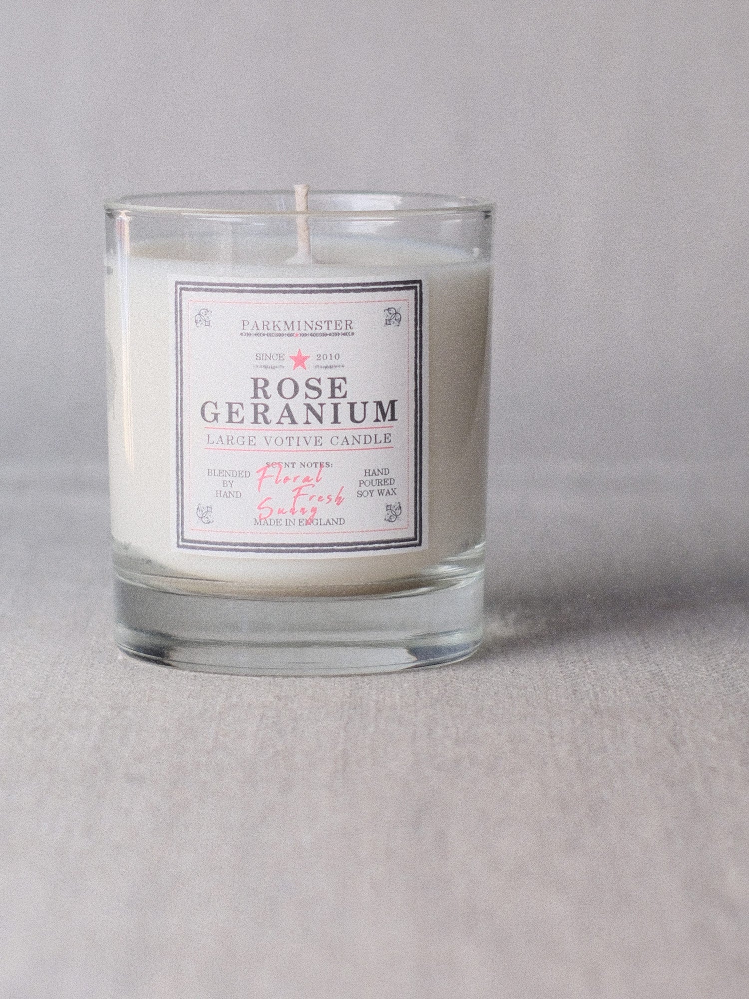 a Rose Geranium Floral scented candle made using Soy Wax by Parkminster