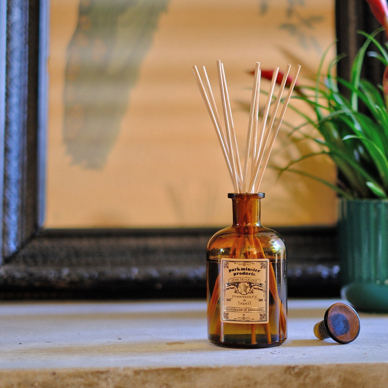 Refresh your home naturally with Parkminster's 200ml amber glass Apothecary Reed Diffuser, featuring the crisp scent of Rosemary & Basil. Crafted by hand in our Cornish workshop using 100% essential oils, this diffuser provides a stylish and eco-friendly fragrance option