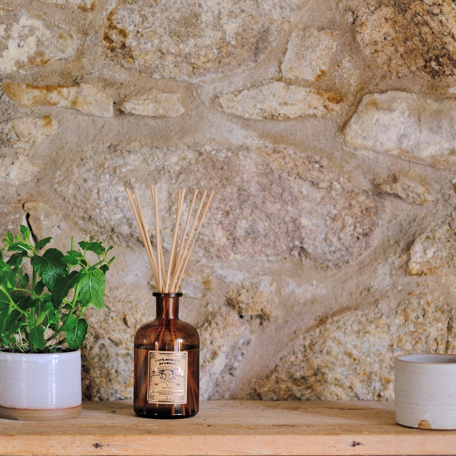 Revitalize your space with the excitingly fresh and herbal scent of Thyme & Mint using Parkminster's 200ml amber glass Apothecary Reed Diffuser. Handcrafted in our Cornish workshop, this diffuser combines stylish contemporary glassware with 100% plant-based ingredients for a refreshing aroma