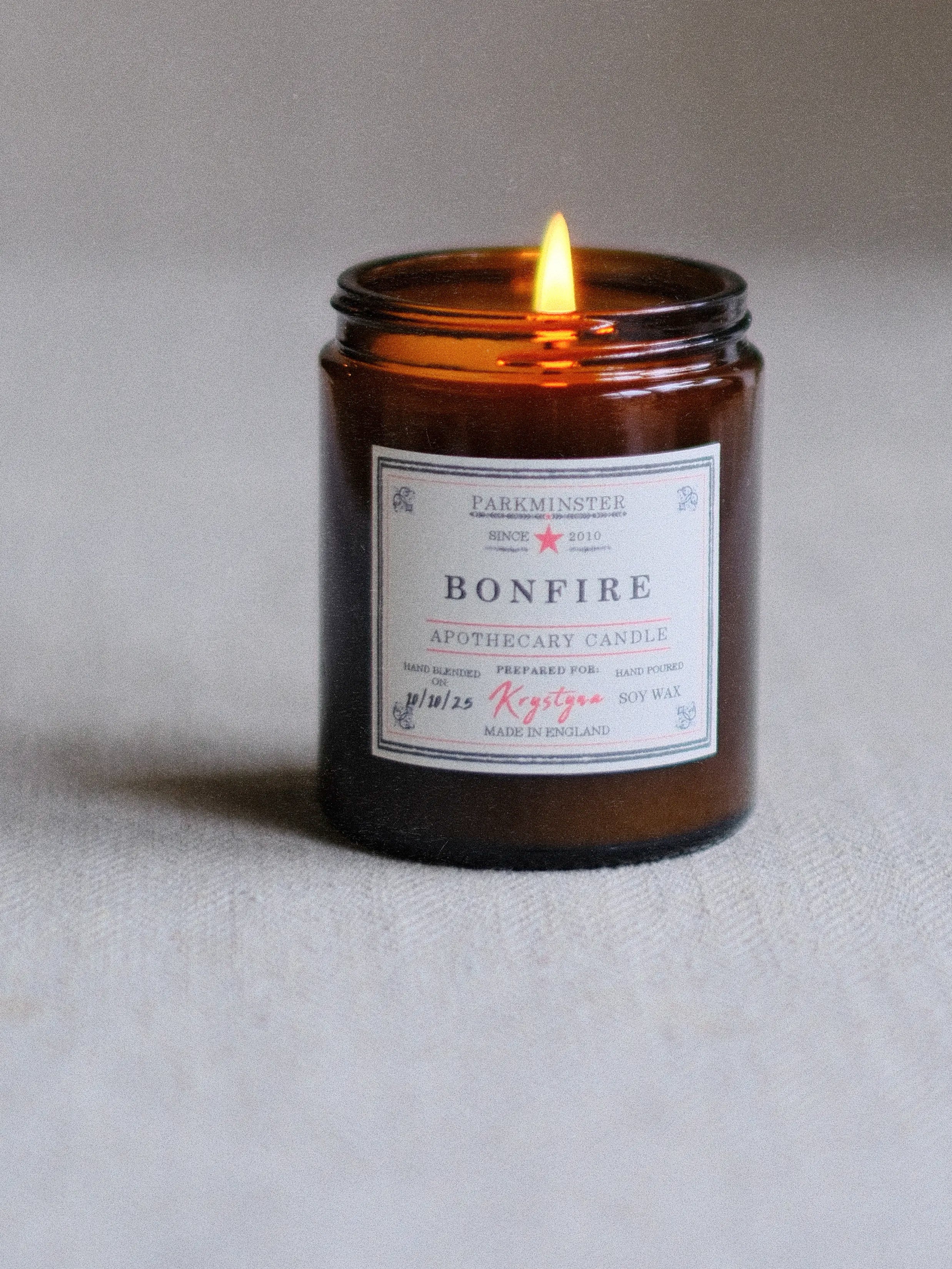 Bonfire Apothecary Candle by Parkminster – natural soy wax candle with rich smoke, wood, and musk notes, perfect for creating a cosy autumn home fragrance.