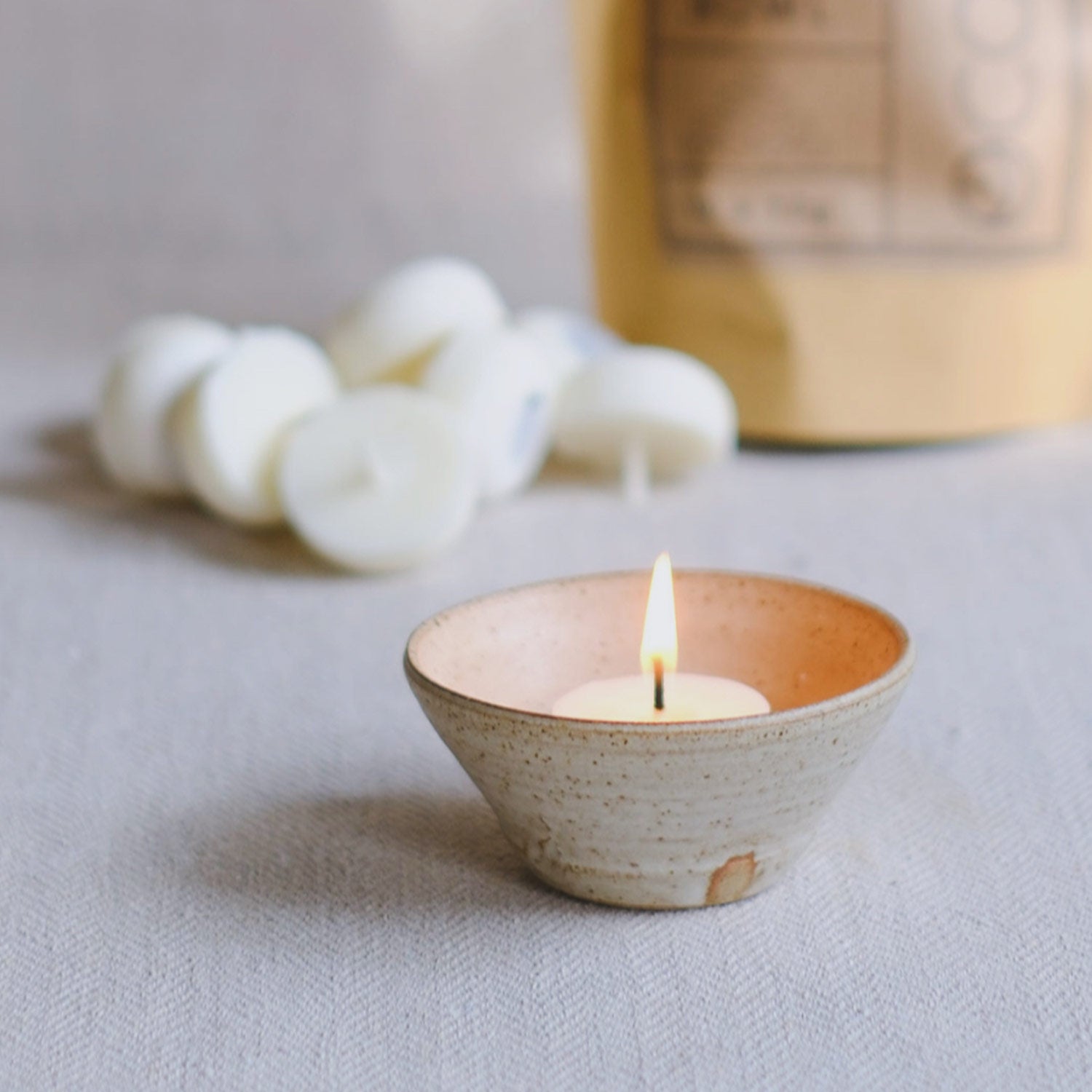 Hand-thrown Candela™ Bowl designed for CANDELA™ Mini Candles, made in the UK by artisan potters. Unique, eco-friendly ceramic bowl for optimal candle burn.