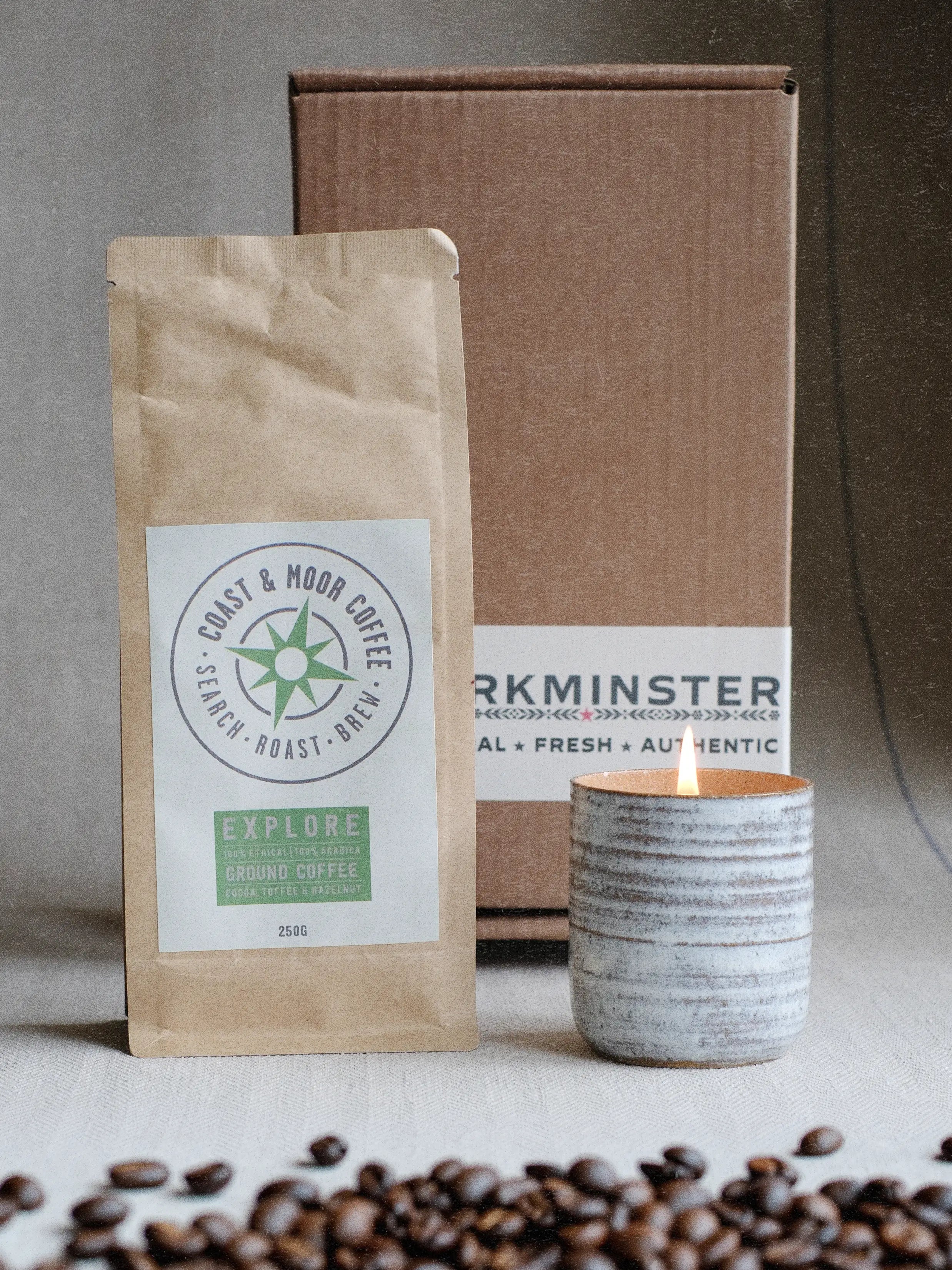 Close up of natural candle gift box for him featuring refillable ceramic candle pot, artisan Cornish coffee and masculine scent selection options
