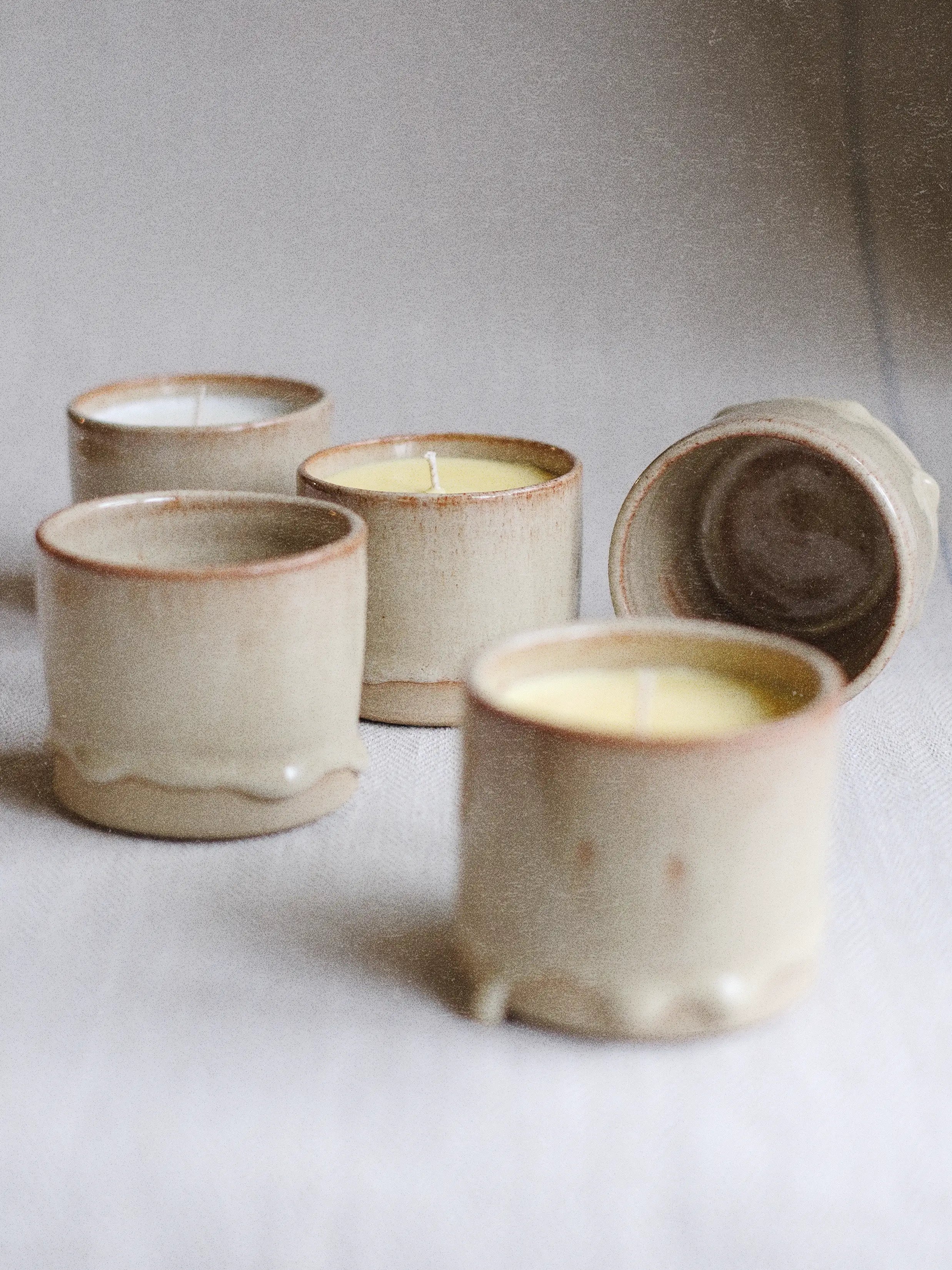 Parkminster Kiln Collection soy wax pot candle in Shino glaze ceramic vessel by Sage Ceramics with natural earthy finish and fragrance blend