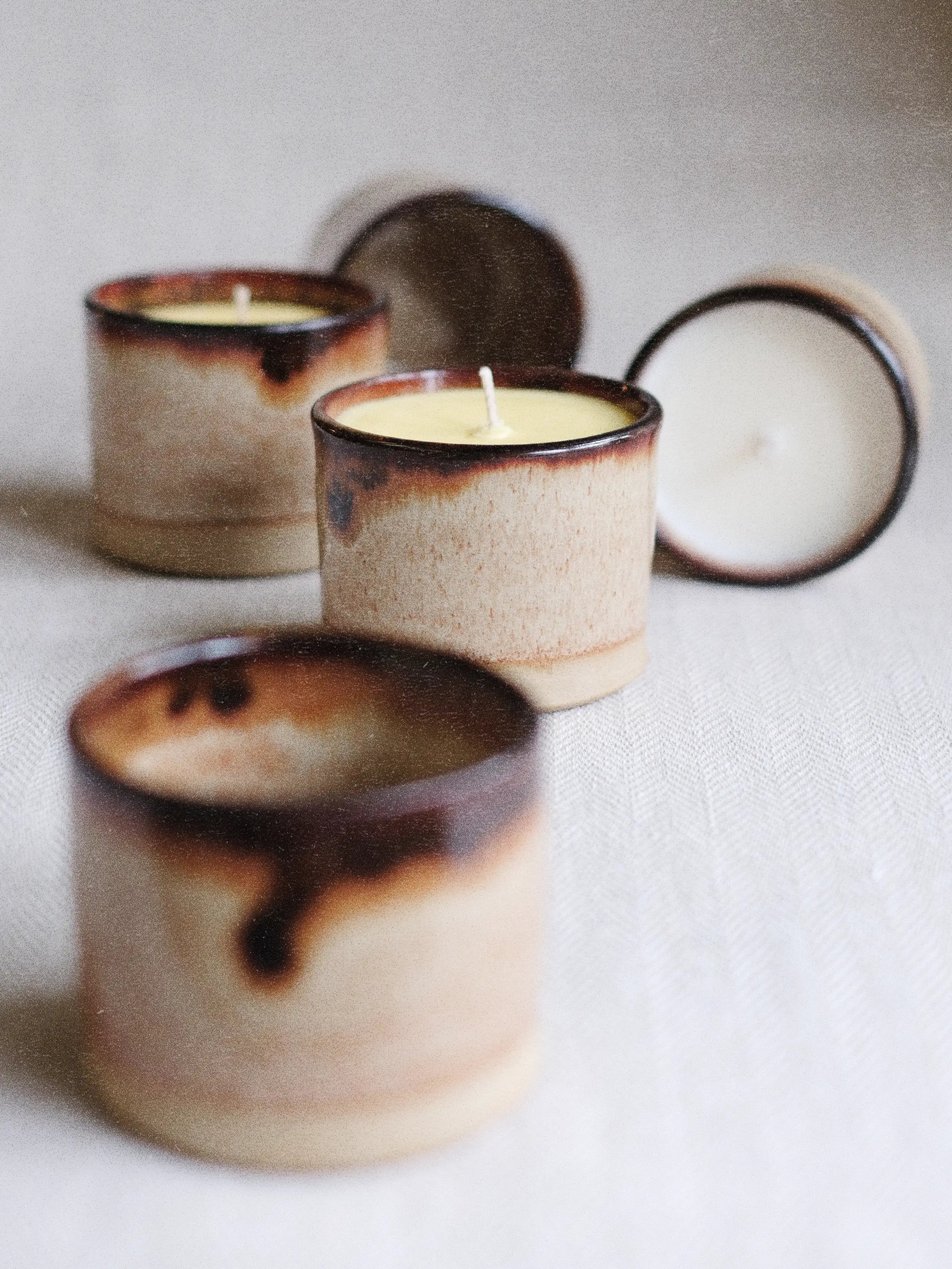 Parkminster Kiln Collection soy wax Pot Candle in Tenmoku glaze ceramic vessel by Sage Ceramics filled with natural fragrance blends