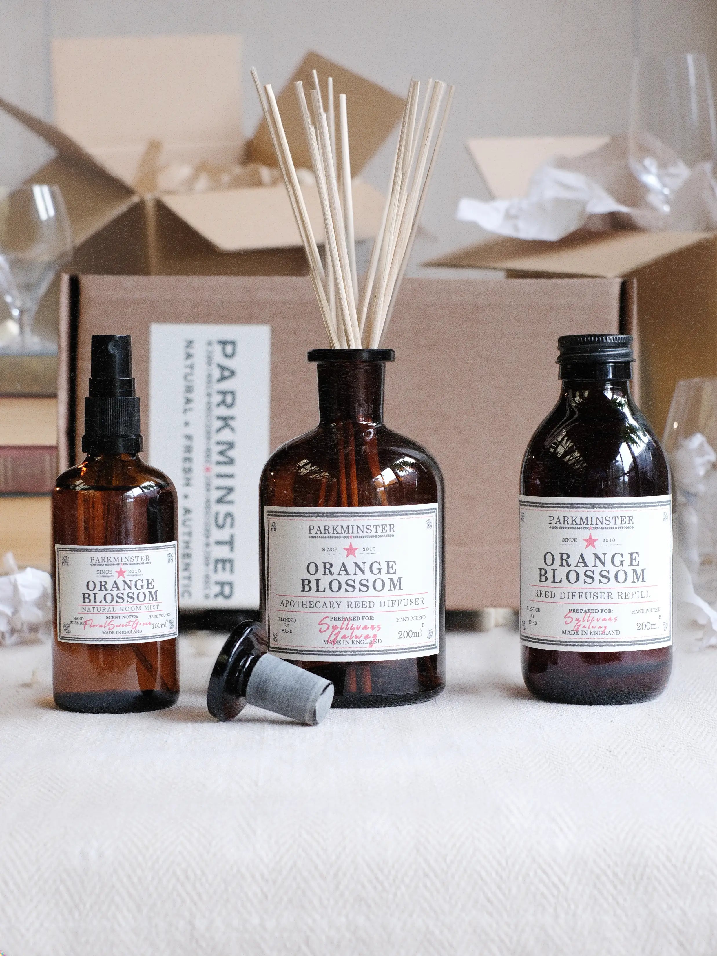 New home fragrance gift box with orange blossom reed diffuser and room mist, presented as a housewarming moving-in gift