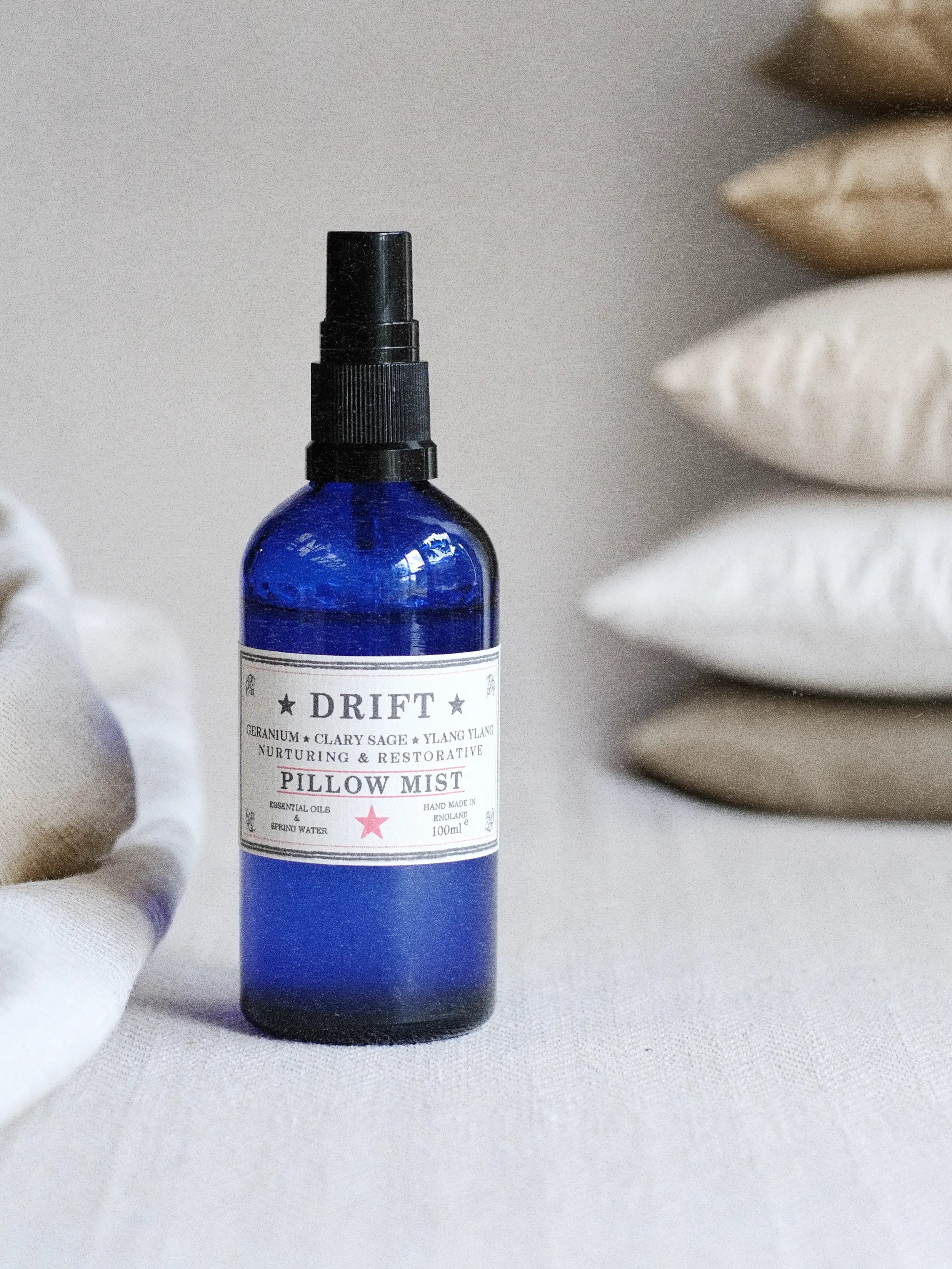 a Parkminster DRIFT pillow mist with geranium clary sage ylang ylang and lavender essential oils in a calming bedroom table setting for restful sleep rituals