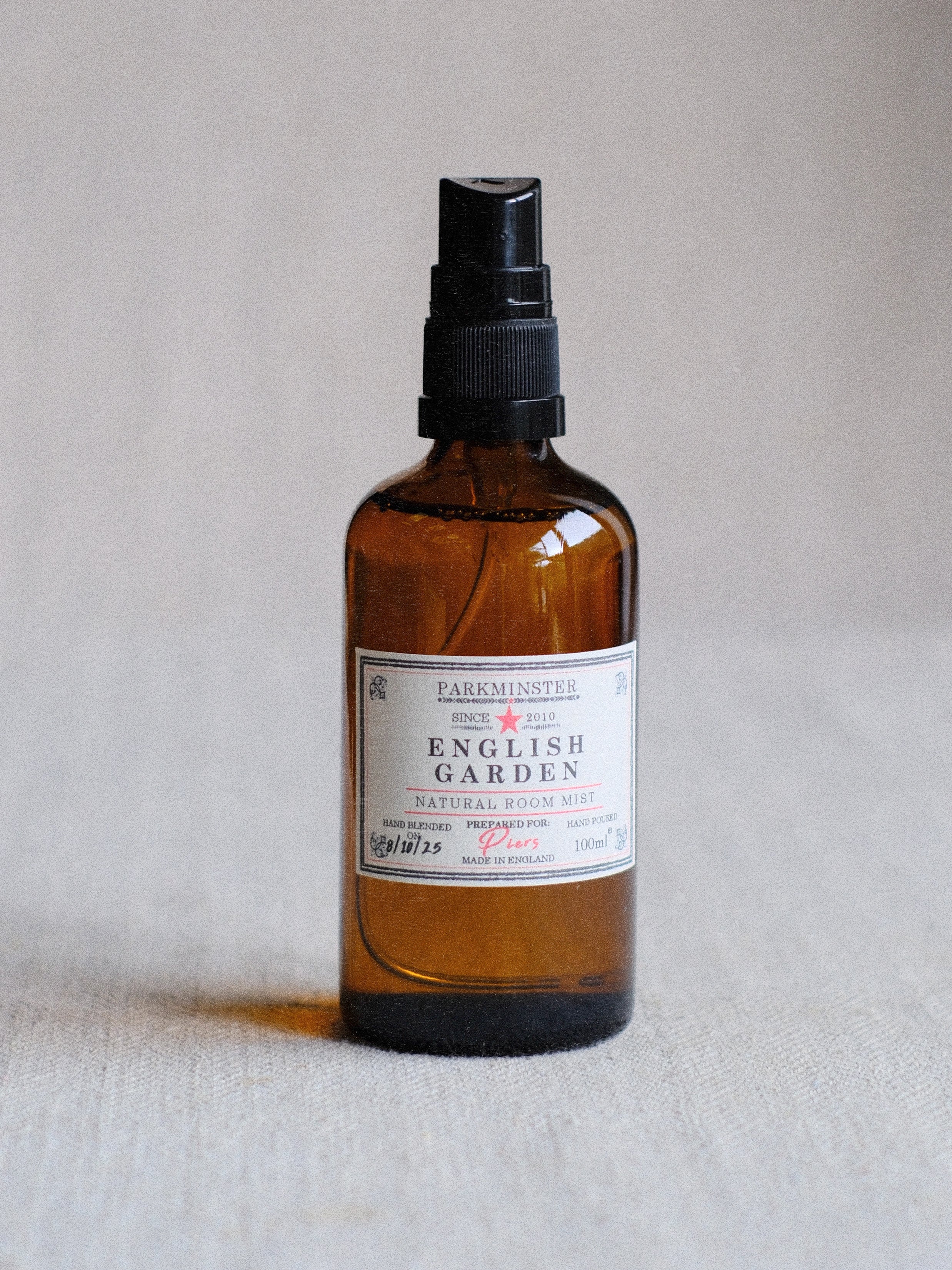 Parkminster English Garden Room Mist, a natural floral home fragrance with jasmine, honeysuckle, rose, and lavender notes.