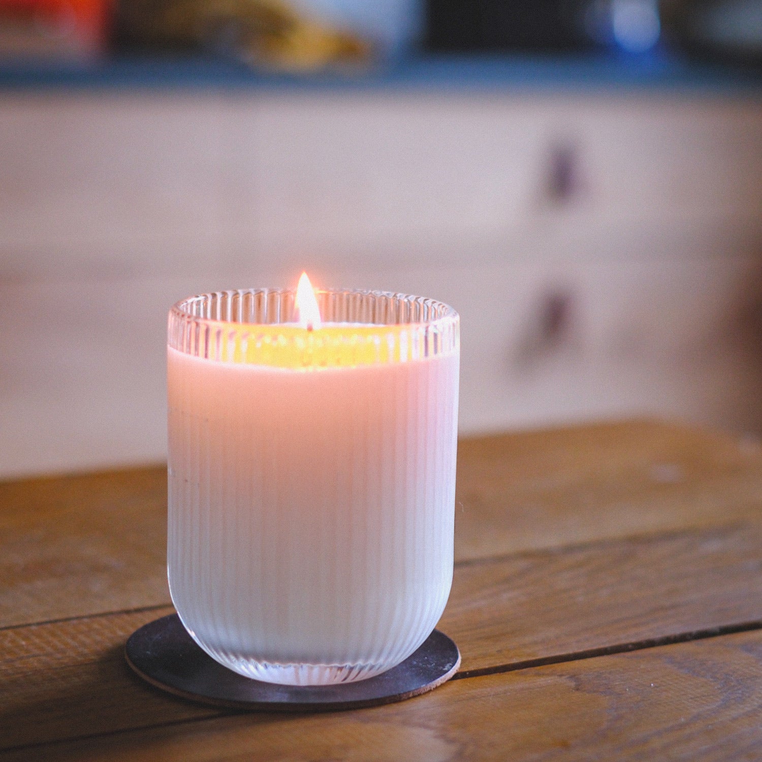 Coconut Haven Scented Candle by Parkminster, natural soy wax with creamy coconut, vanilla, and orchid fragrance in ribbed glassware for a tropical glow.