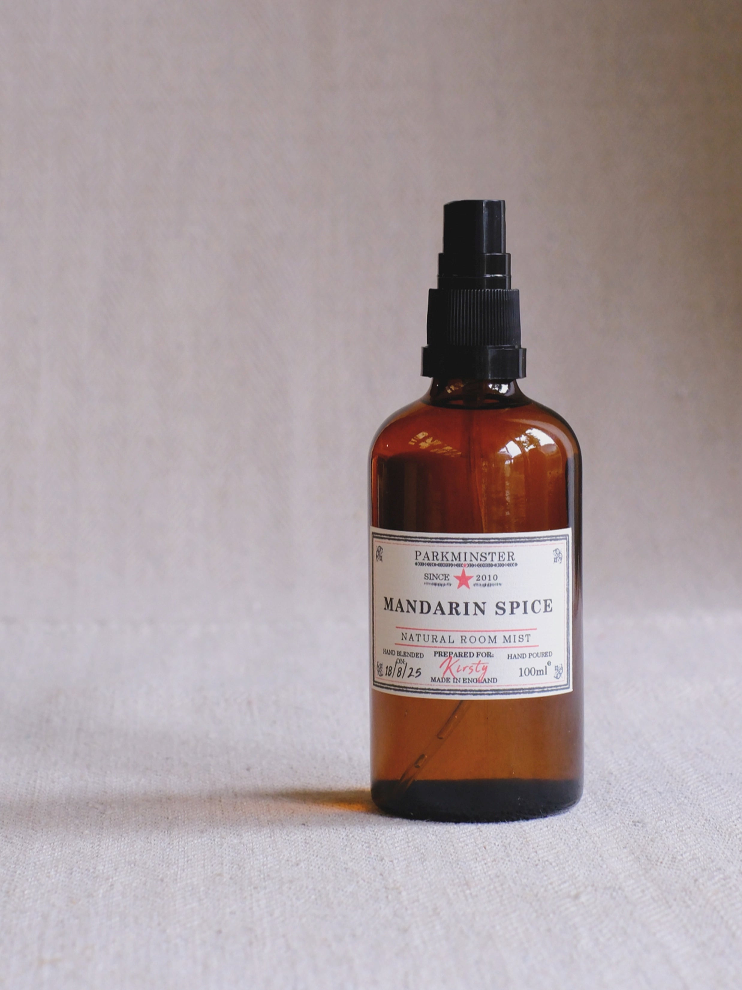 Parkminster natural room mist in our Mandarin Spice scent  emitting a warm, festive citrus-spice fragrance – natural room spray, pillow spray, home fragrance - 100 ml 