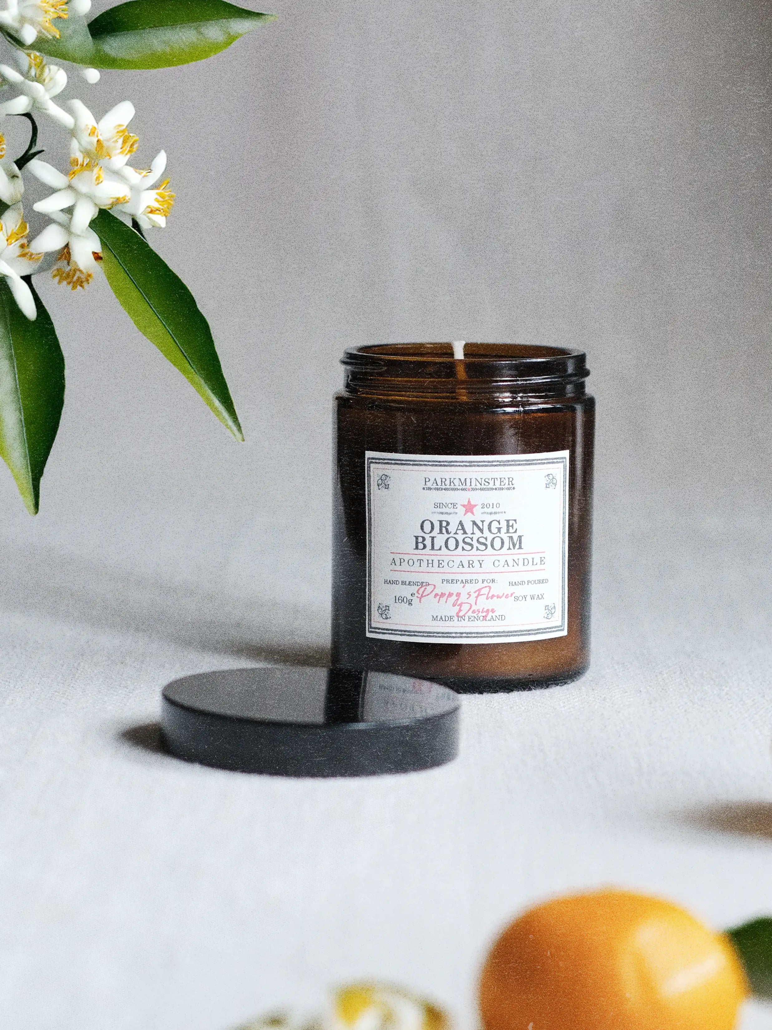 Parkminster Orange Blossom Apothecary Candle in vintage amber glass jar with natural soy wax and fresh citrus floral fragrance for bright and elegant home interiors