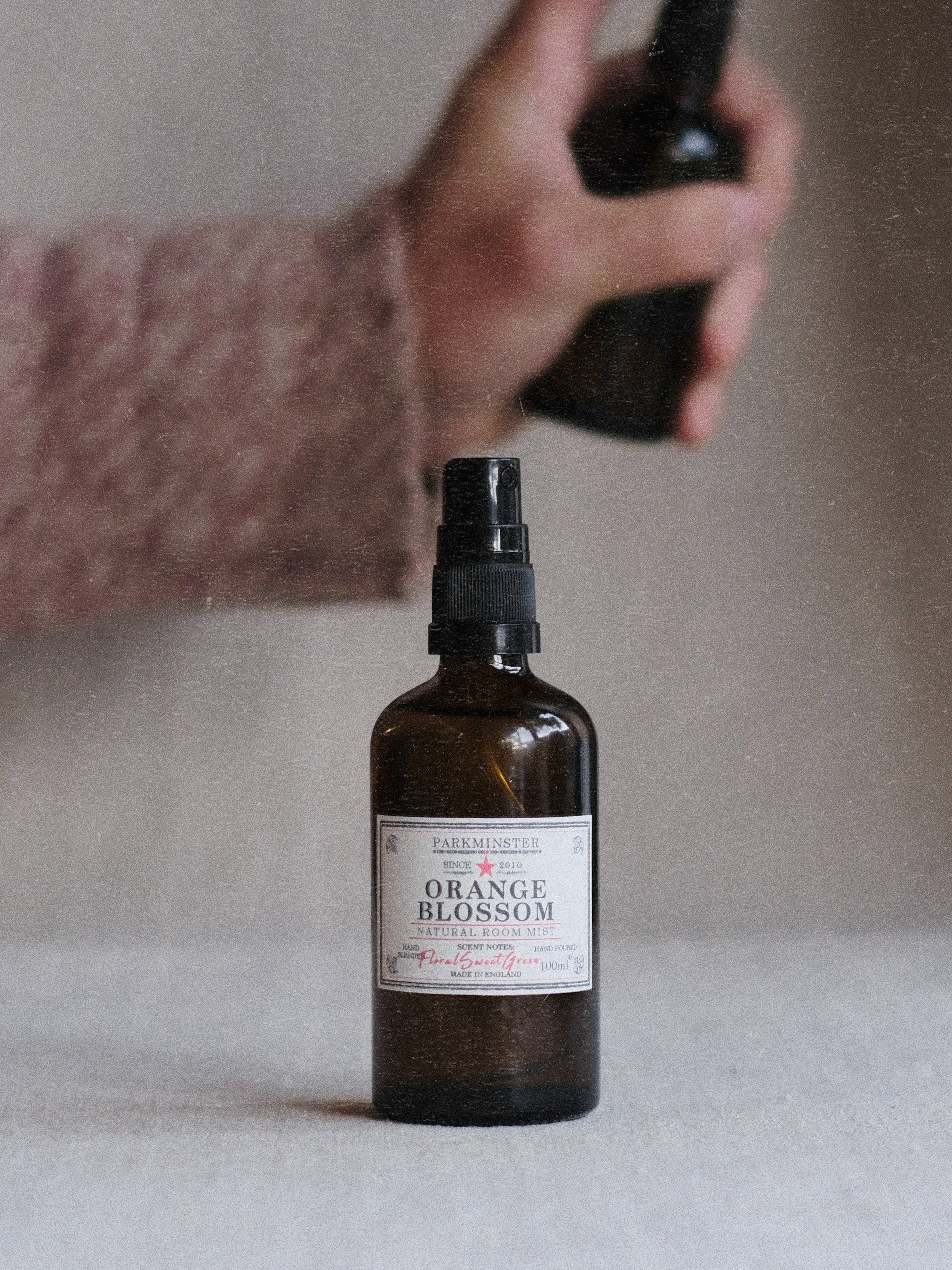 Parkminster Orange Blossom Room Spray releasing a fresh, floral citrus fragrance to naturally refresh your home.