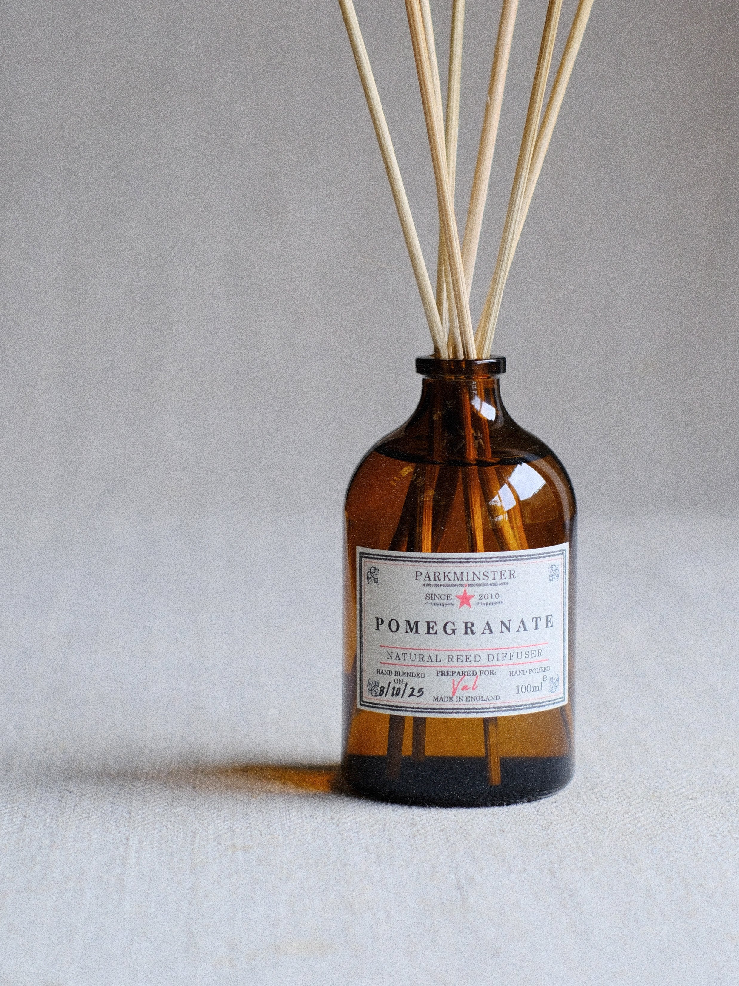 Natural Pomegranate Reed Diffuser by Parkminster, crafted with plant-based ingredients for a vibrant, long-lasting scent that fills your home.