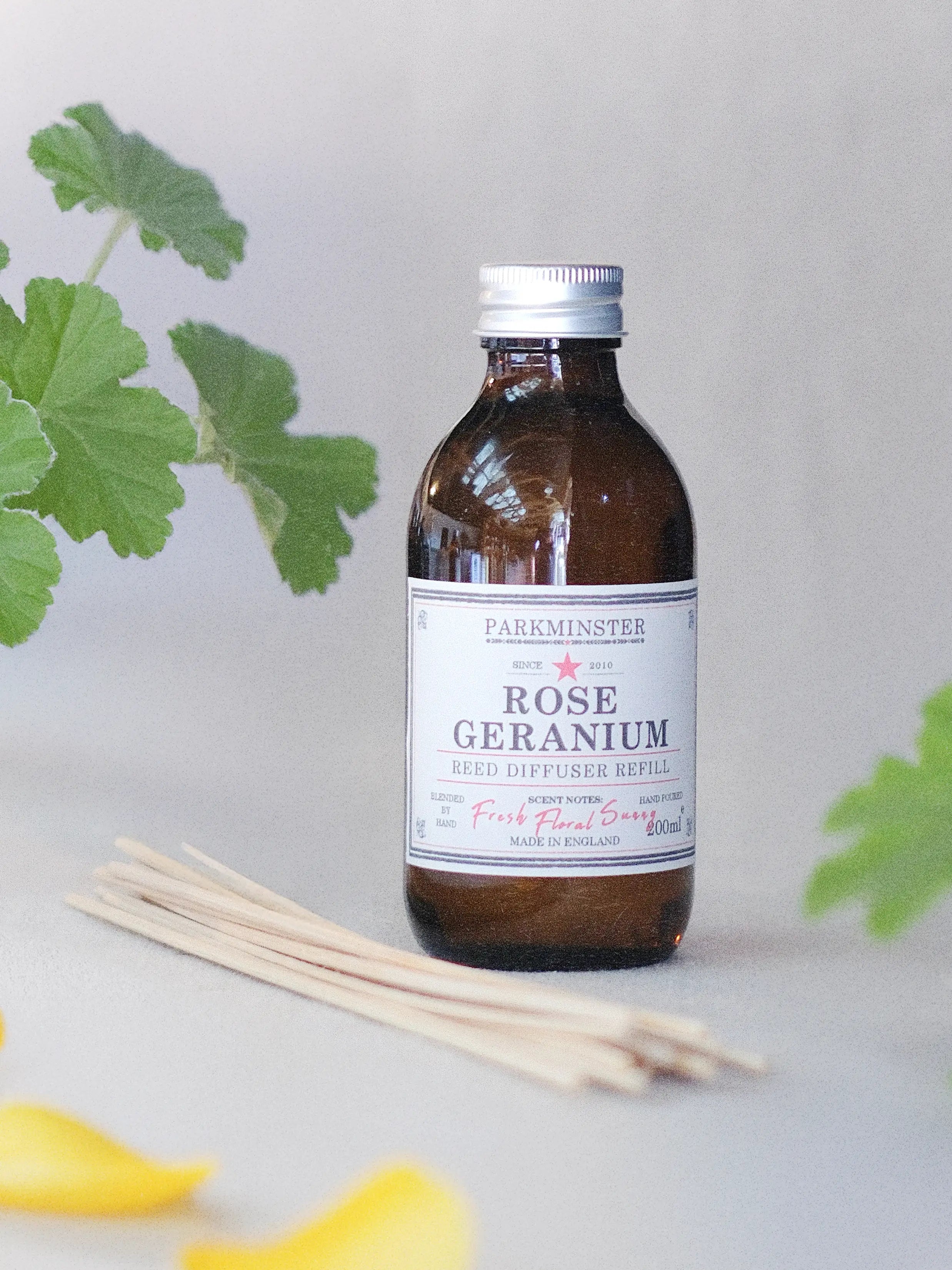 a Natural Rose Geranium Reed Diffuser Refill by Parkminster with pure essential oil fragrance and 14 free reeds, perfect for slow living and a calm, fresh home.